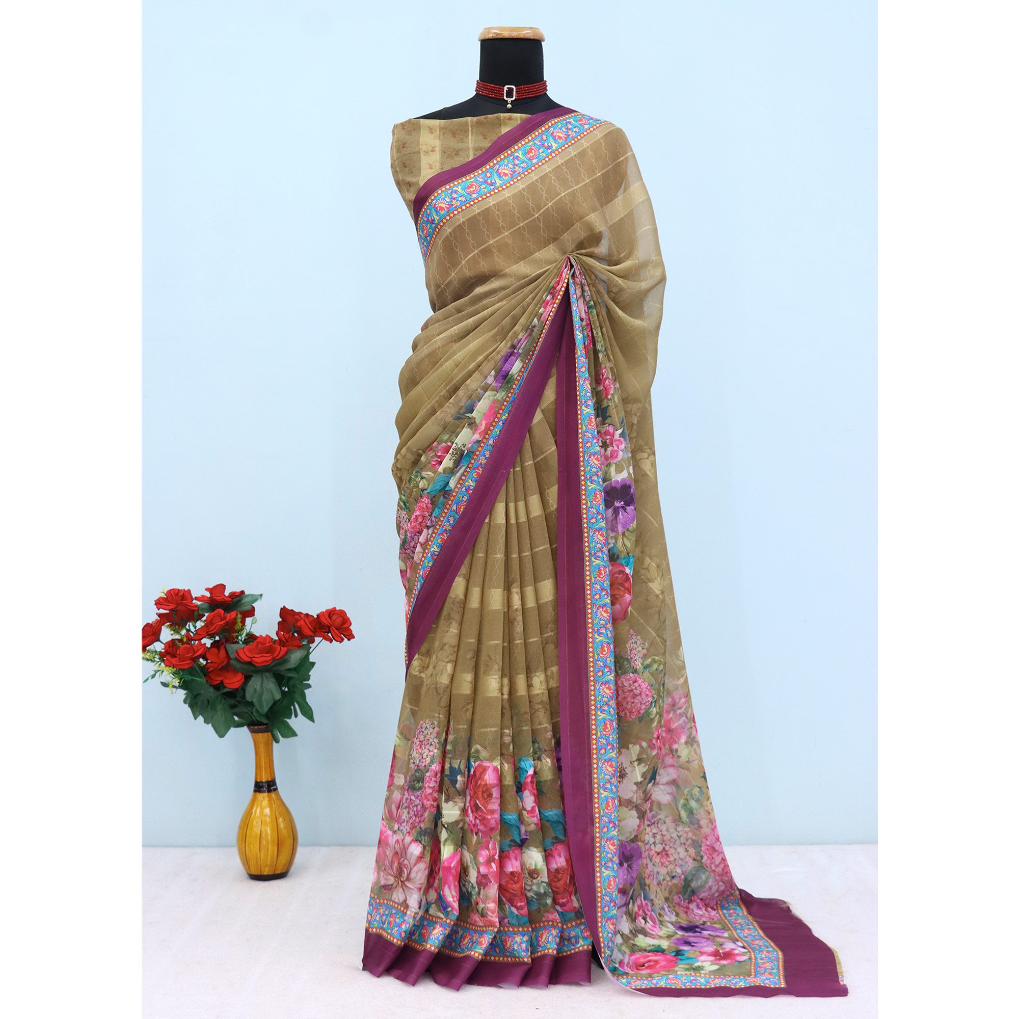 Charming Mehendi & Green Floral Digital Printed Georgette Saree Accentuated With Zari Stripes