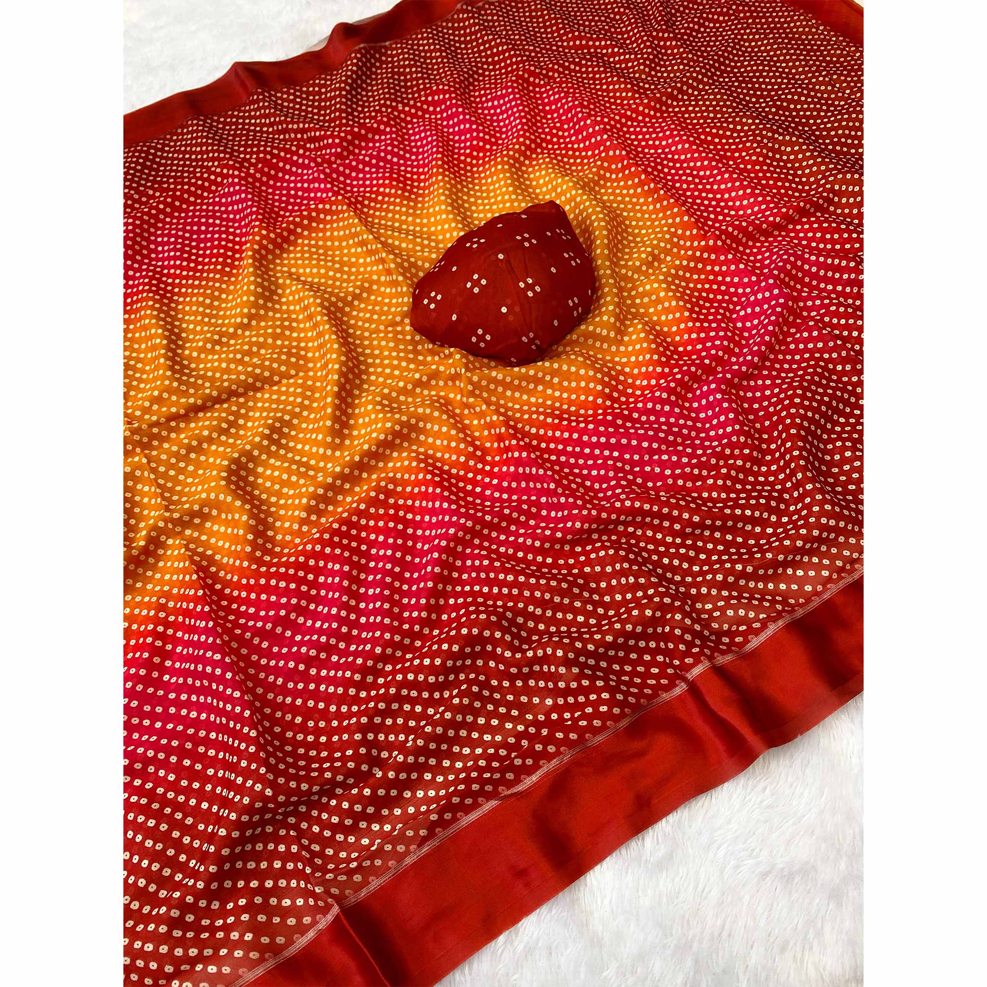 Designer Bandhani Saree in Mustard & Red Crafted from Soft Moss Georgette