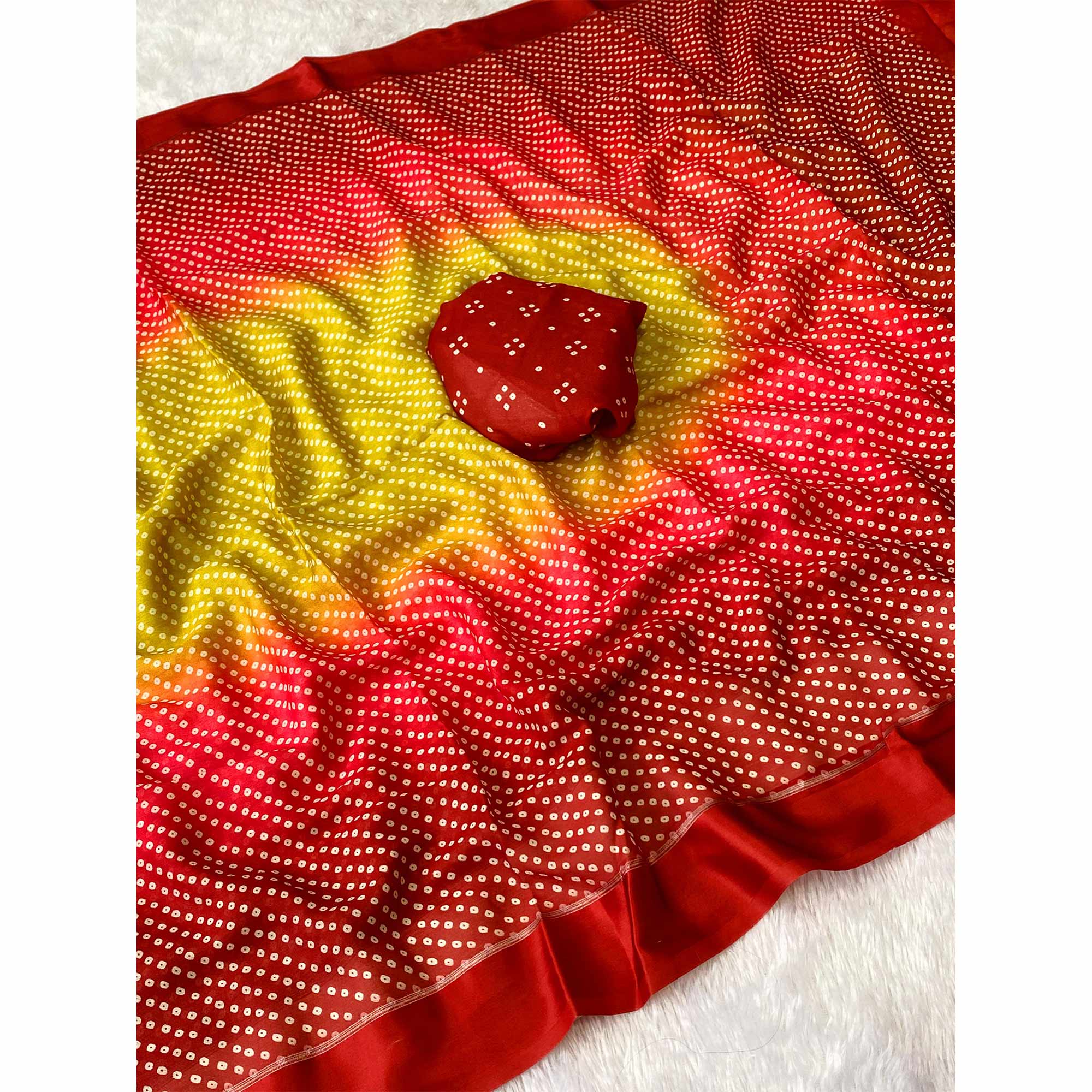Traditional Bandhani Moss Georgette Saree in Dual Tone Yellow & Red