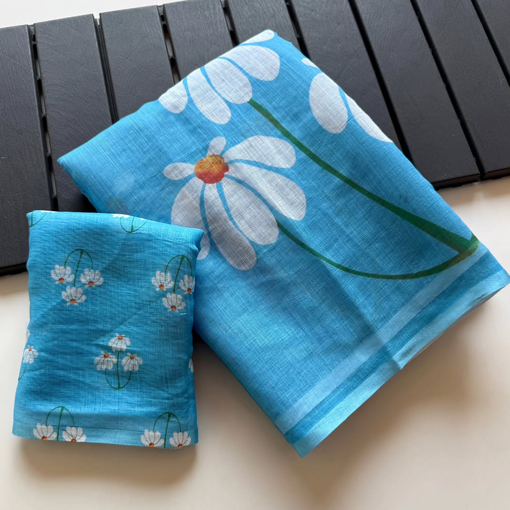 Graceful Sky Blue Linen Cotton Saree with Stylish Floral Prints for Effortless Elegance