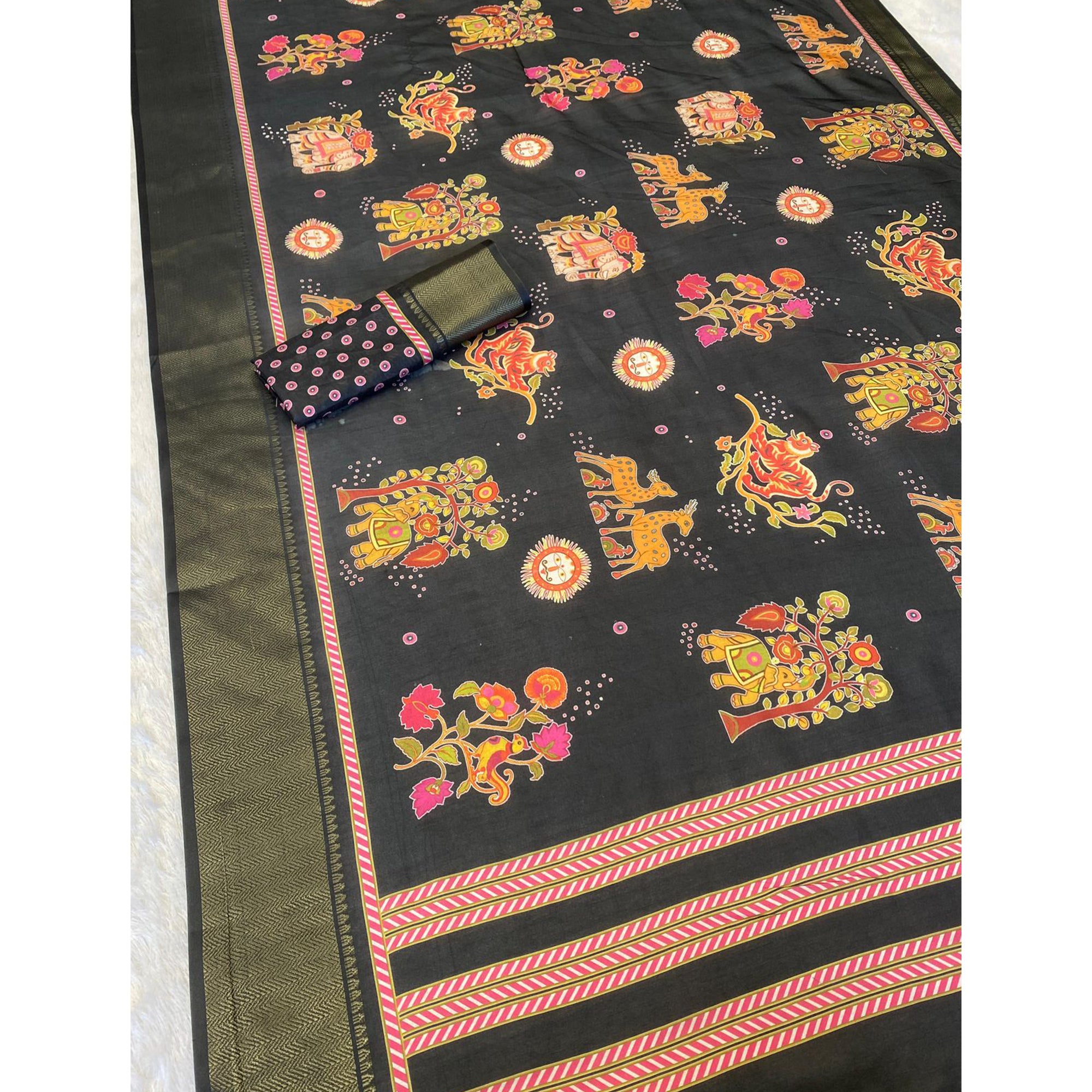 Black Traditional Printed Dola Silk Saree Accented with Rich Zari Weaving