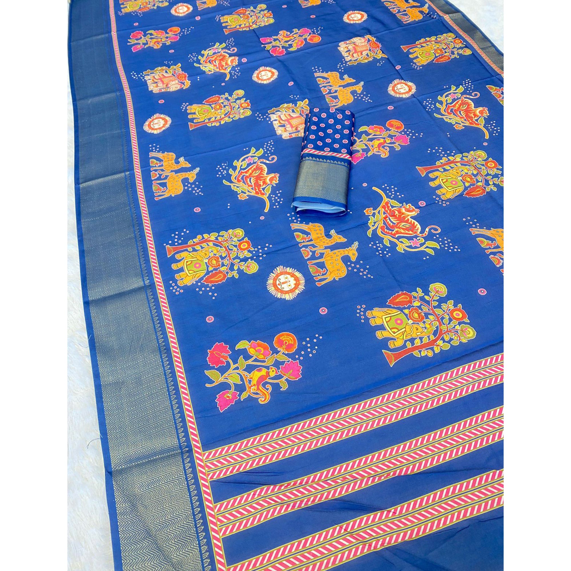 Blue Traditional Printed Dola Silk Saree Accented with Rich Zari Weaving