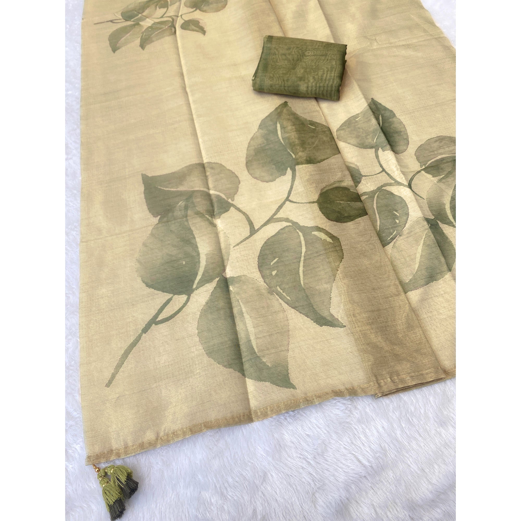 Sophisticated Light Pista Green Floral Digital Print Tissue Saree Enhanced With Handmade Tassels