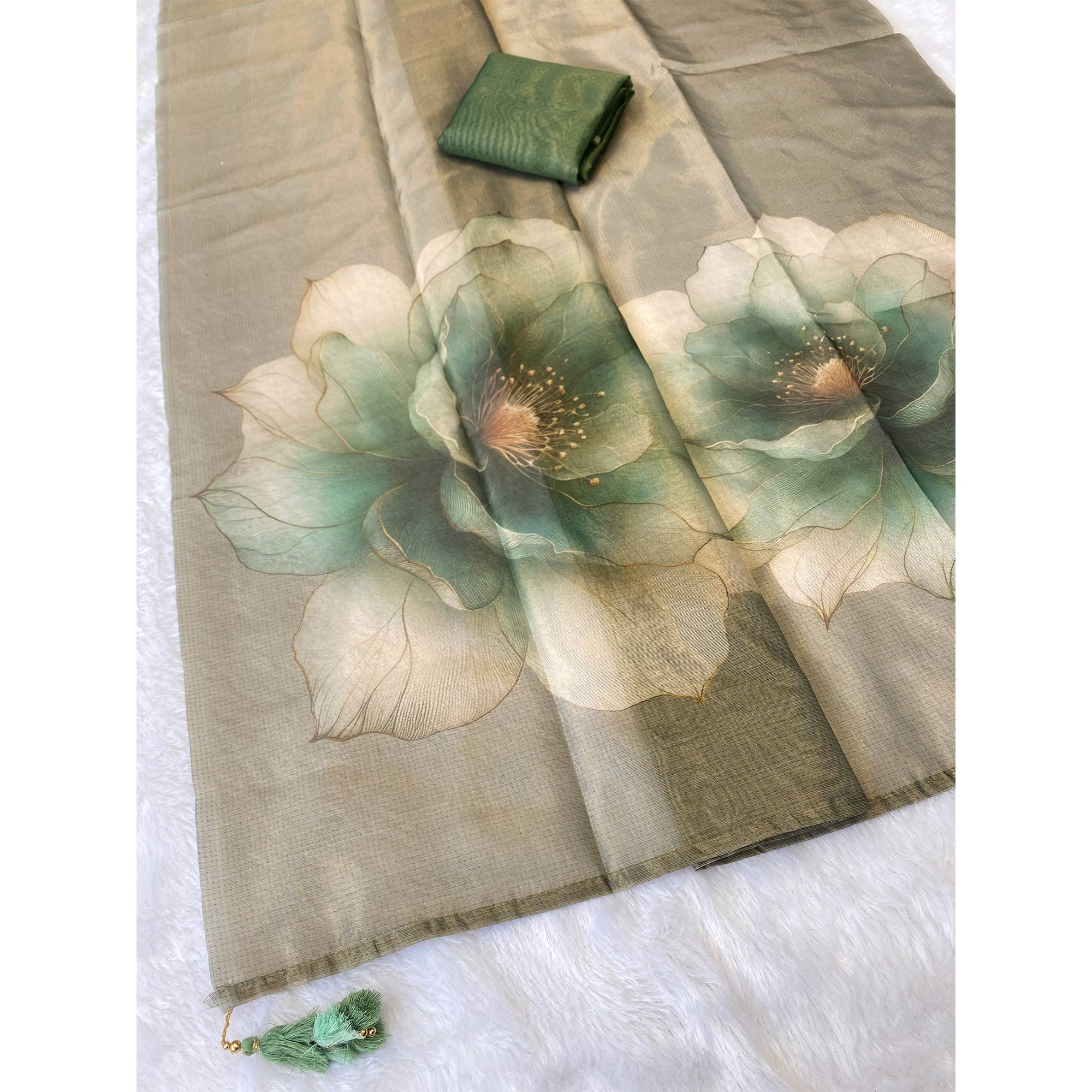 Sophisticated Dusty Green Floral Digital Print Tissue Saree Enhanced With Handmade Tassels
