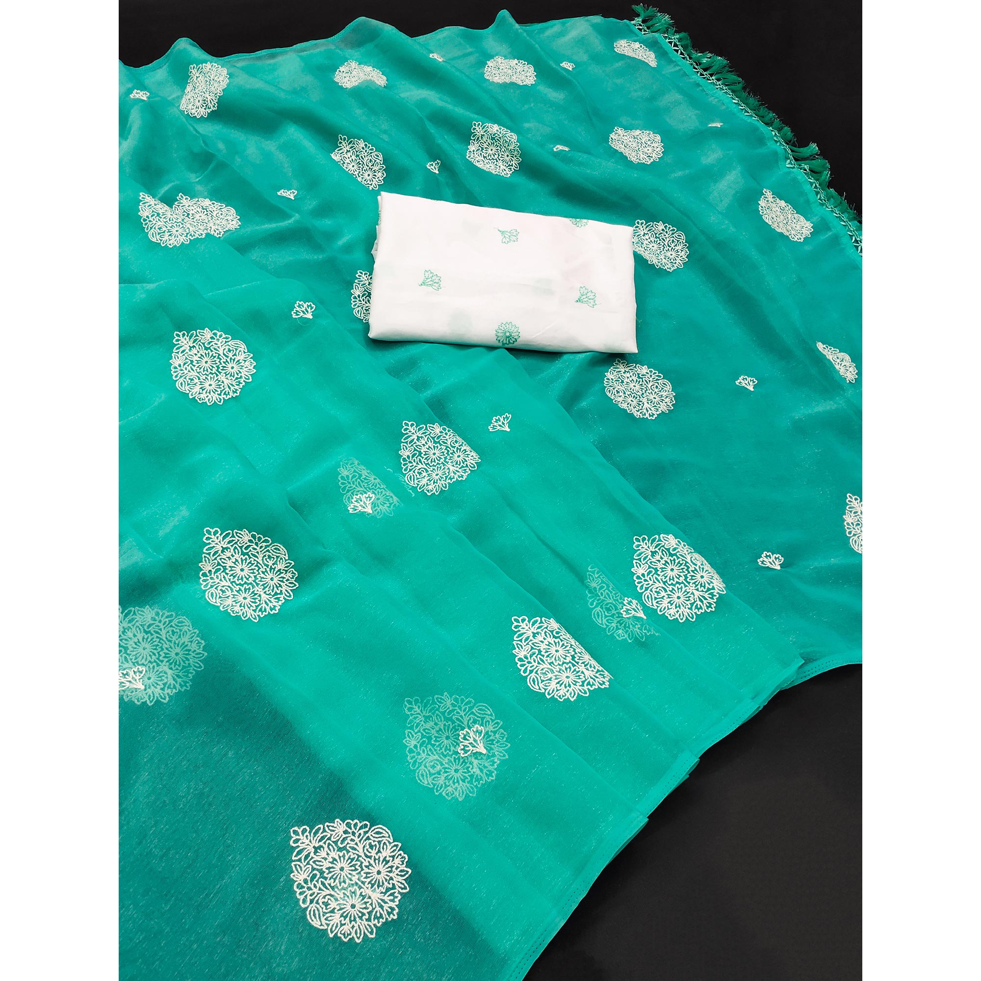 Turquoise Embroidered Chiffon Saree With Elegant Tassel Borders