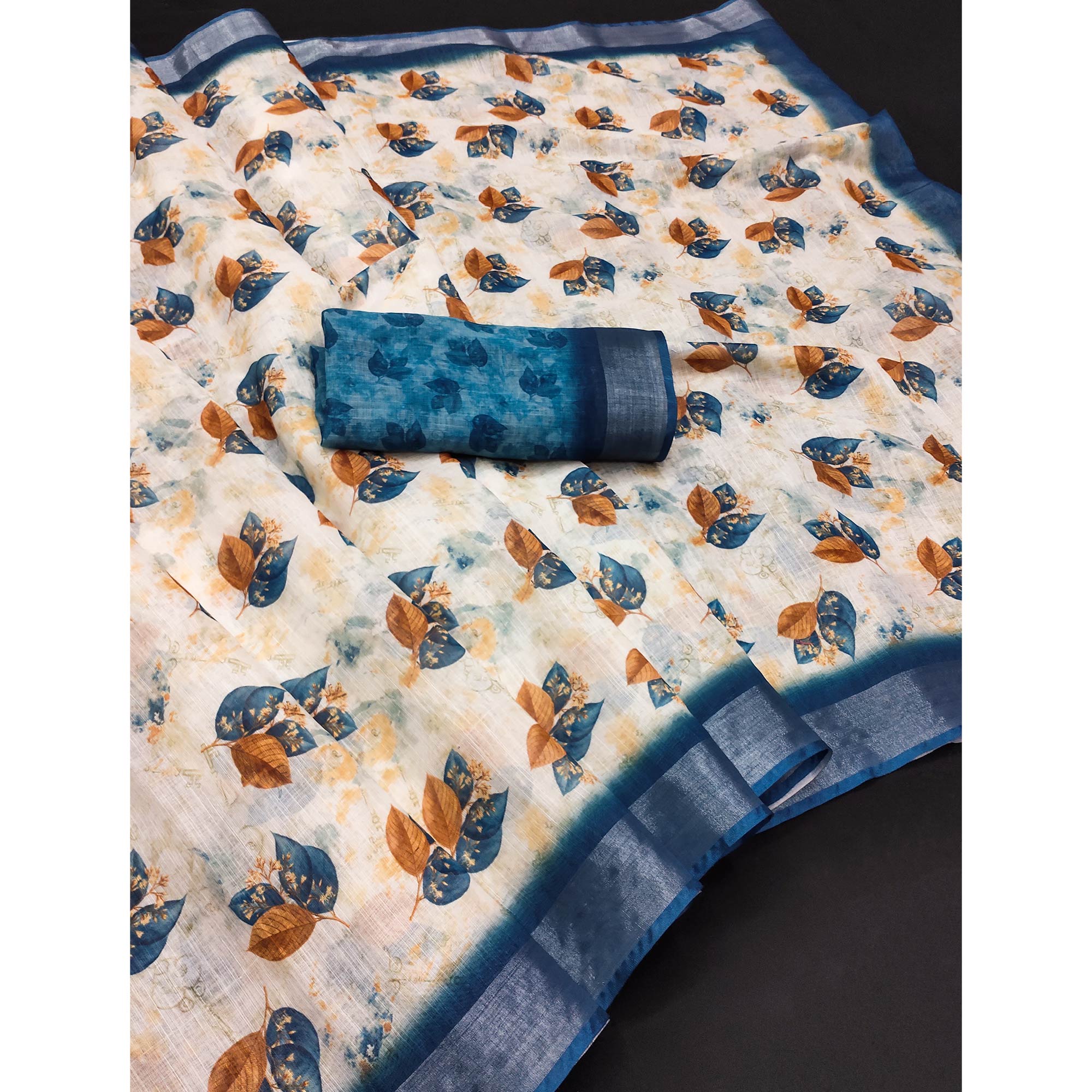 Off-White Linen Printed Saree Adorned with Florals and Subtle Zari Trim