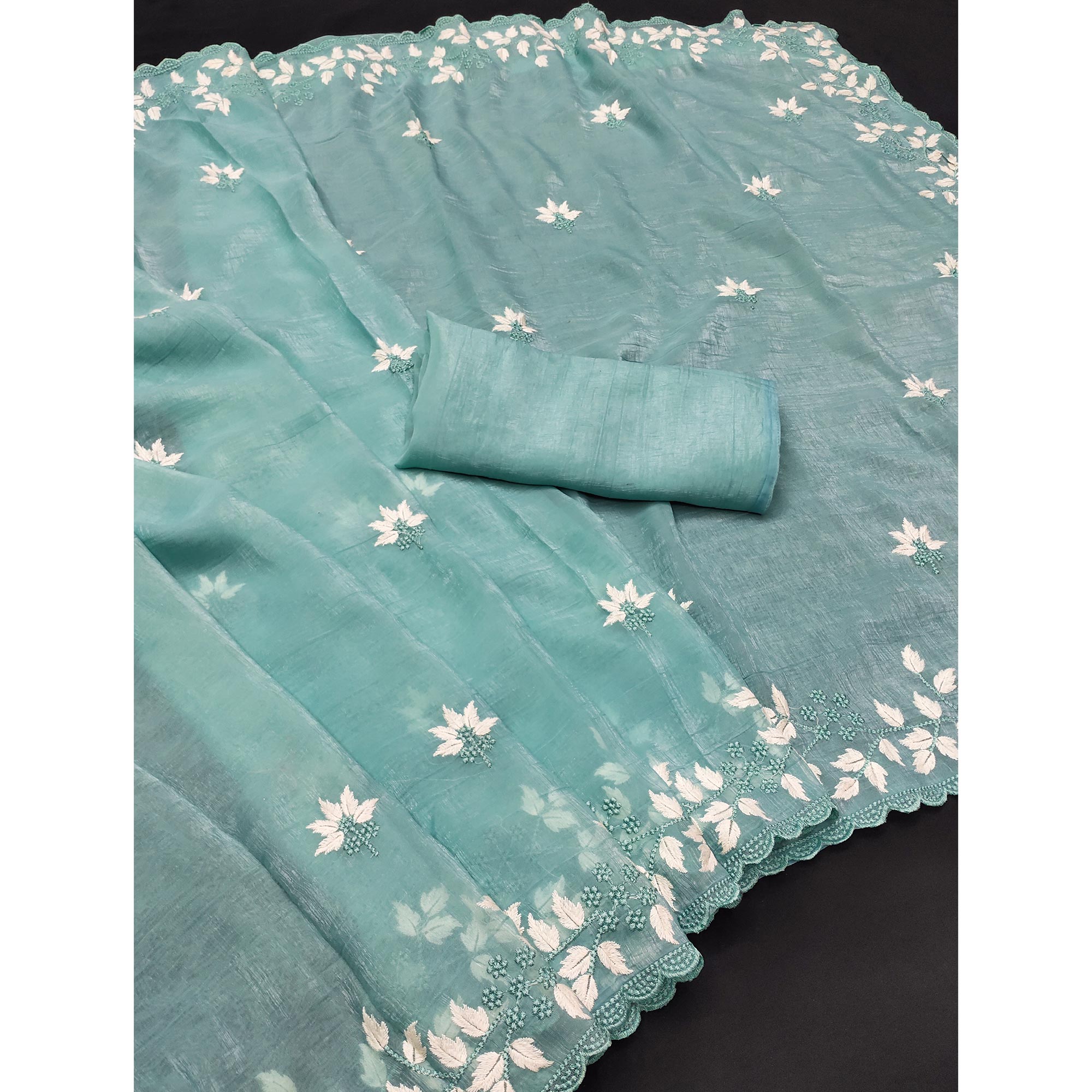 Turquoise Organza Saree Featuring Fine Floral Embroidery