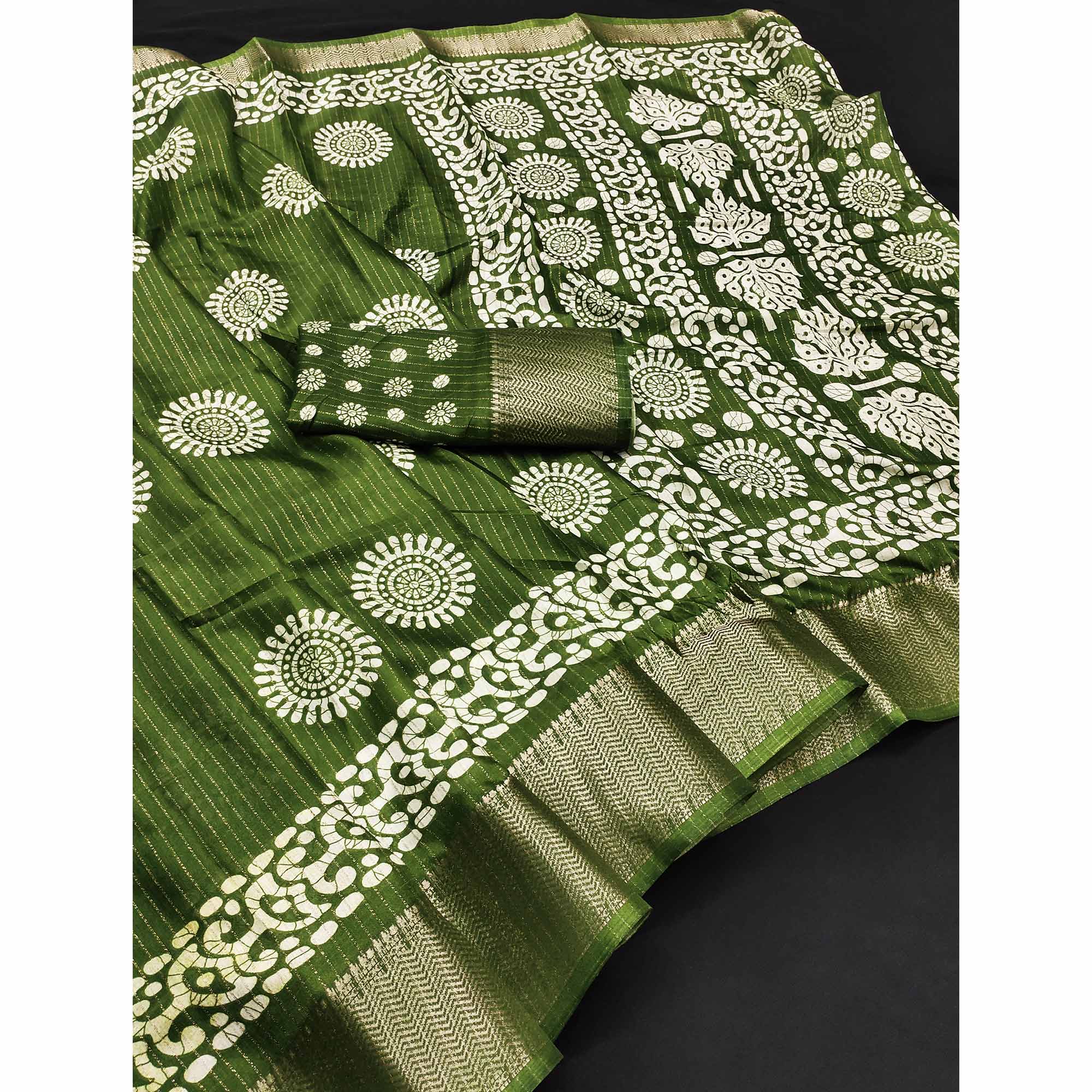 Classic Green Dola Silk Saree Adorned with Floral Motifs & Rich Zari Work