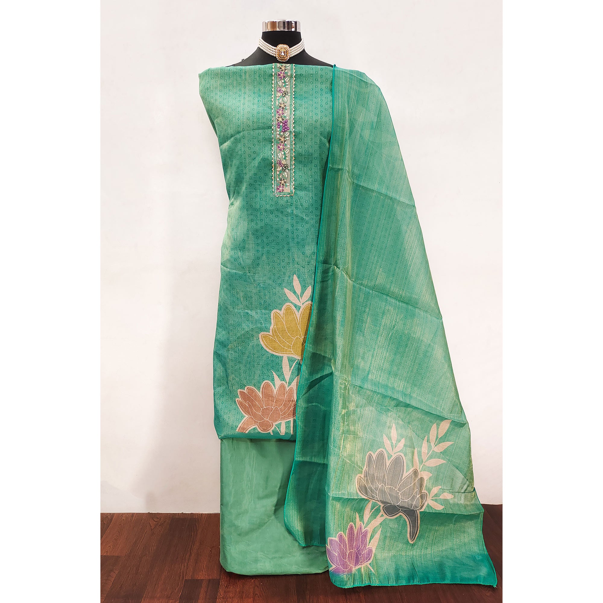 Green Art Silk Dress Material Adorned with Soft Floral Prints for a Regal Ethnic Touch