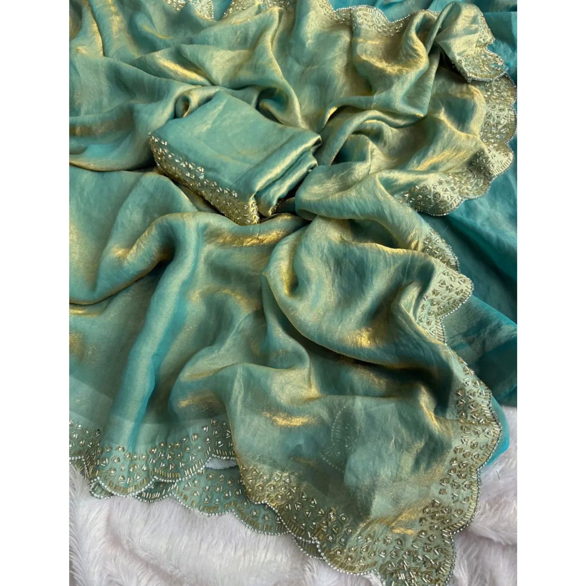 Elegant Sea Green Satin Saree Embellished in Gold Shine