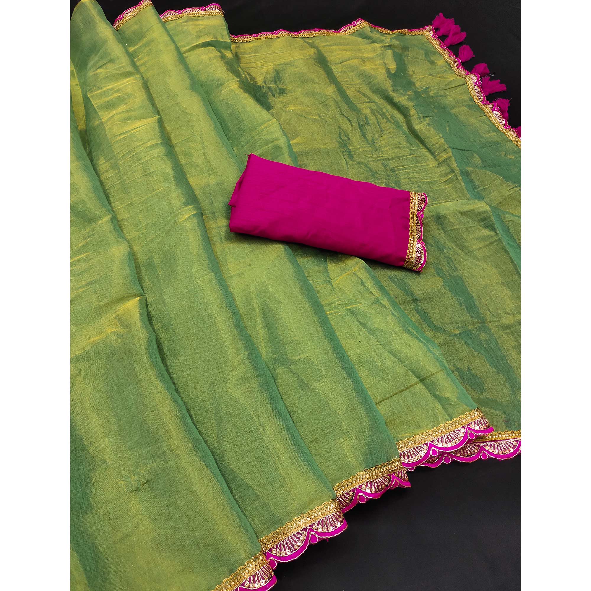Green Beige Solid Tissue Saree Enhanced With Graceful Embroidered Lace Border Work