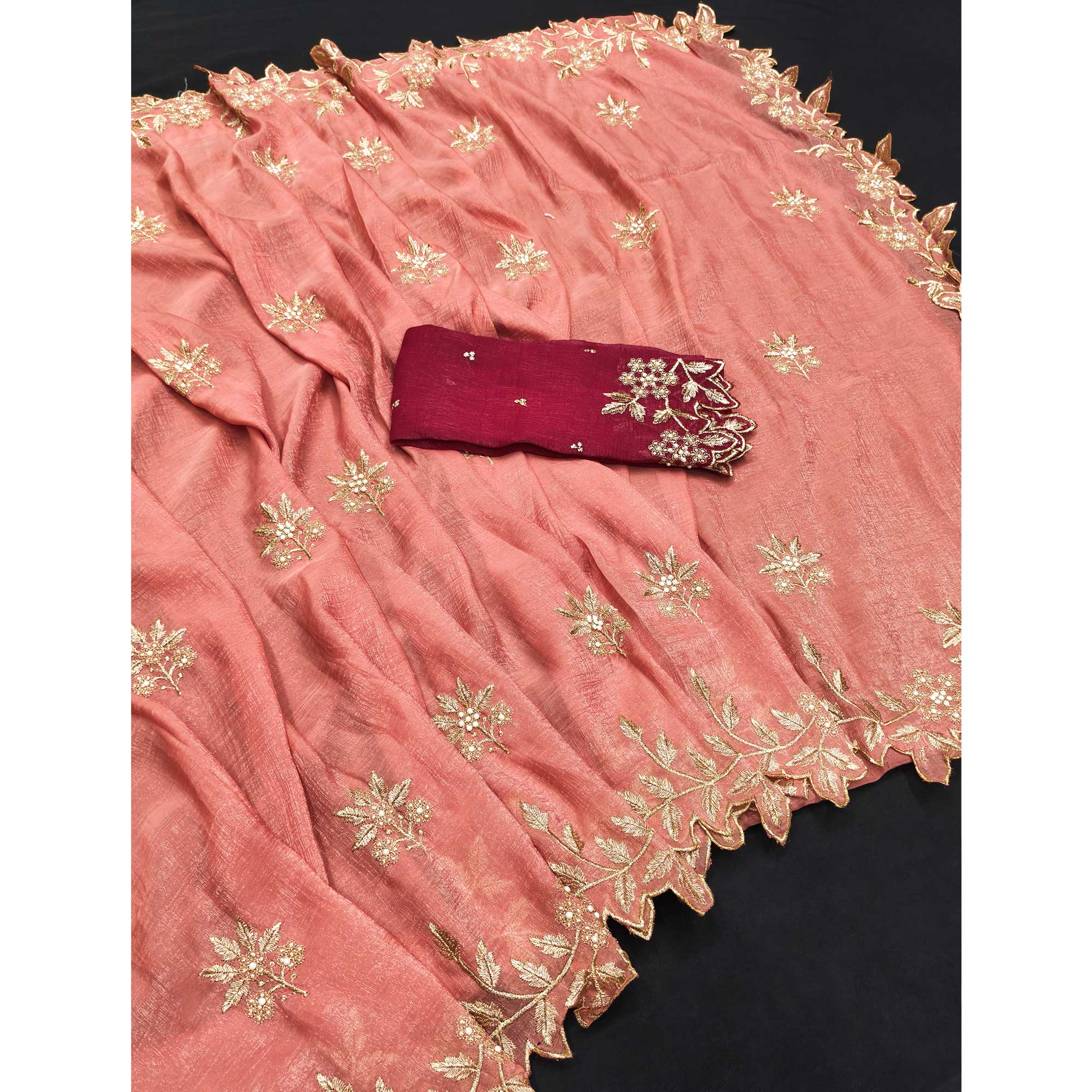 Regal Peach Chiffon Saree Adorned with Intricate Golden Embroidery