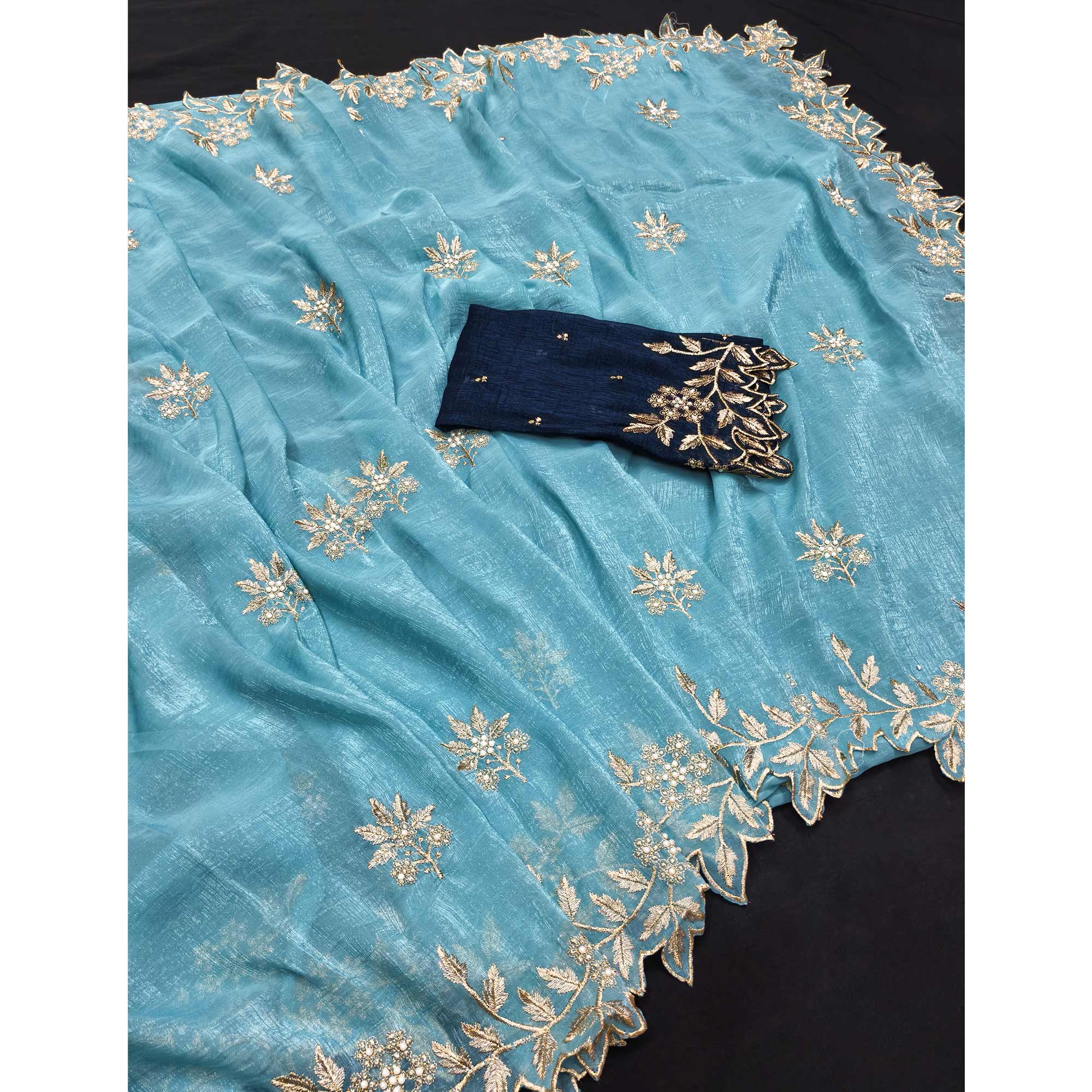 Regal Sky Blue Chiffon Saree Adorned with Intricate Golden Embroidery