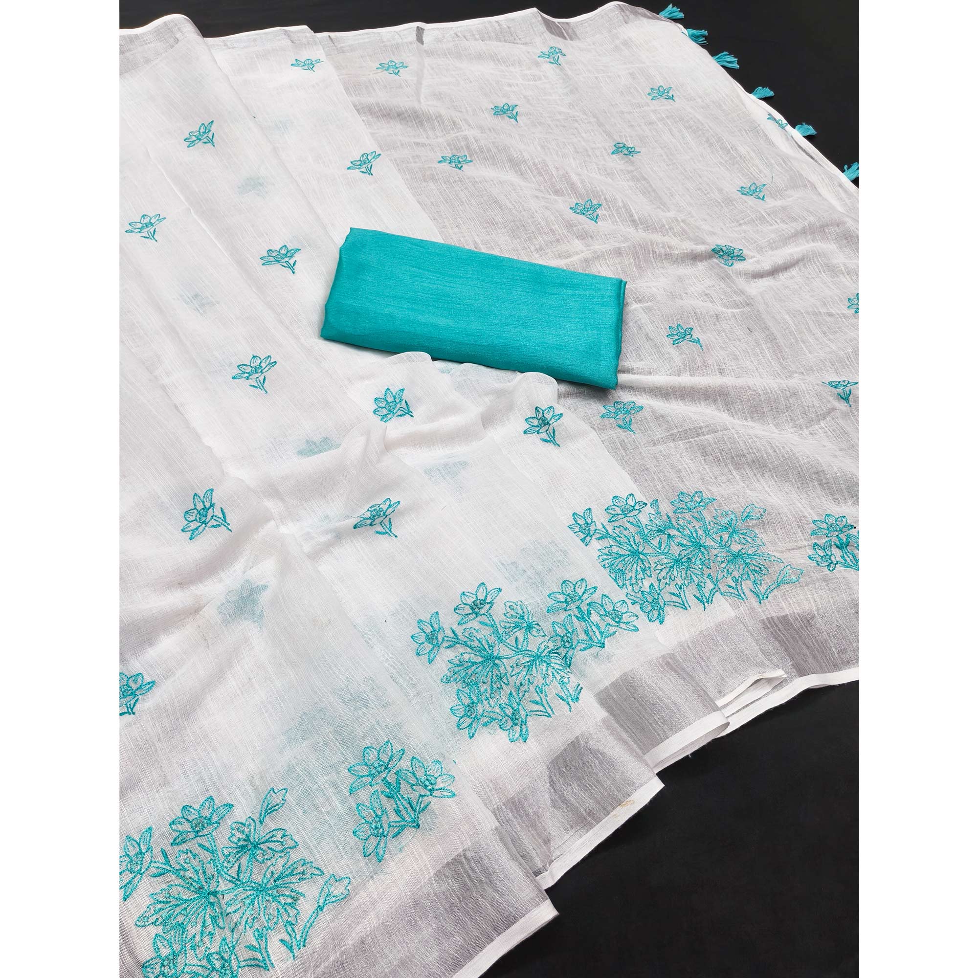 White & Blue Floral Embroidered Linen Saree Perfect for Festive Occasions