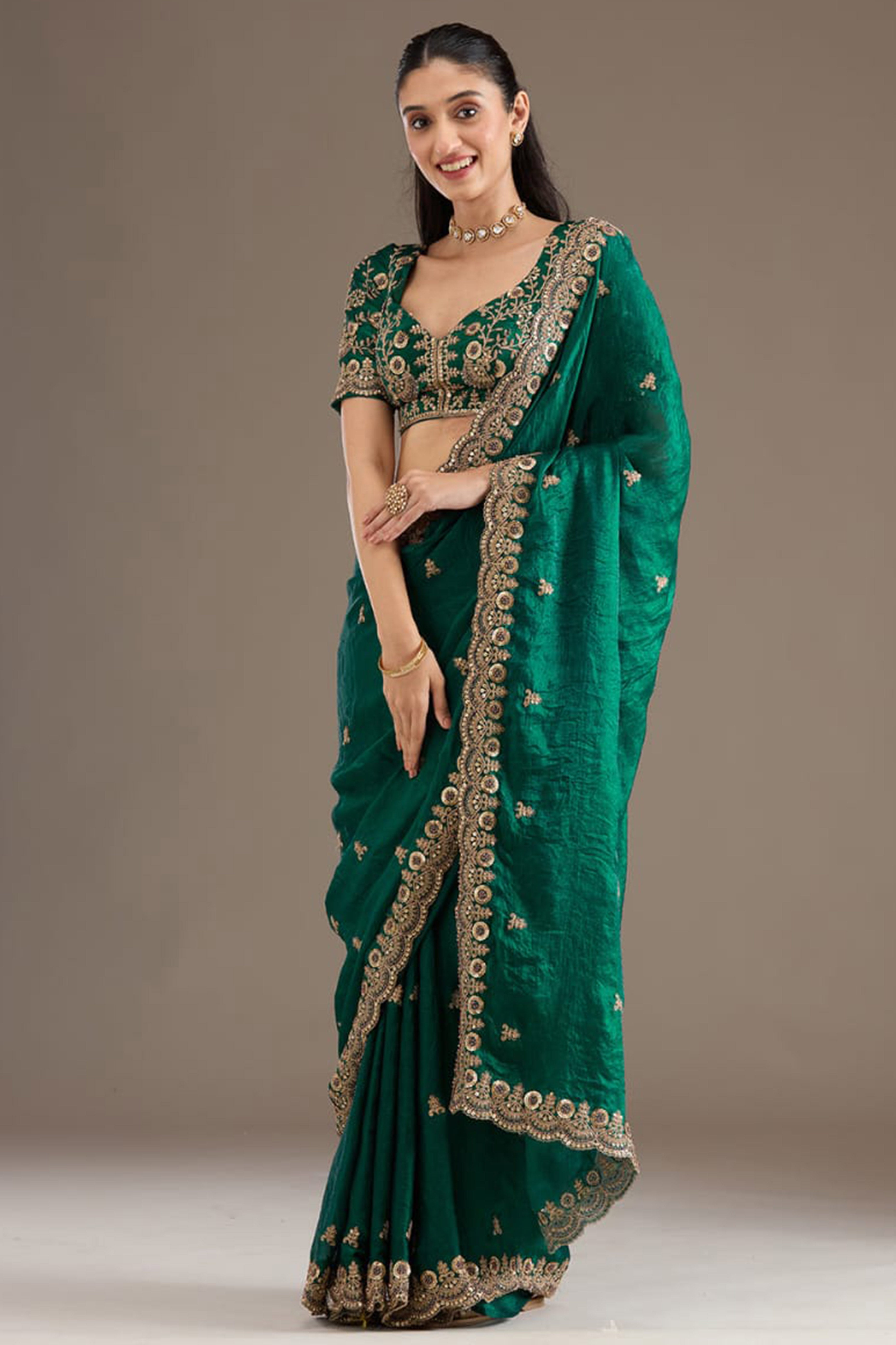 Trendy Green Fancy Satin Saree Enhanced With Rich Golden Embroidered Design