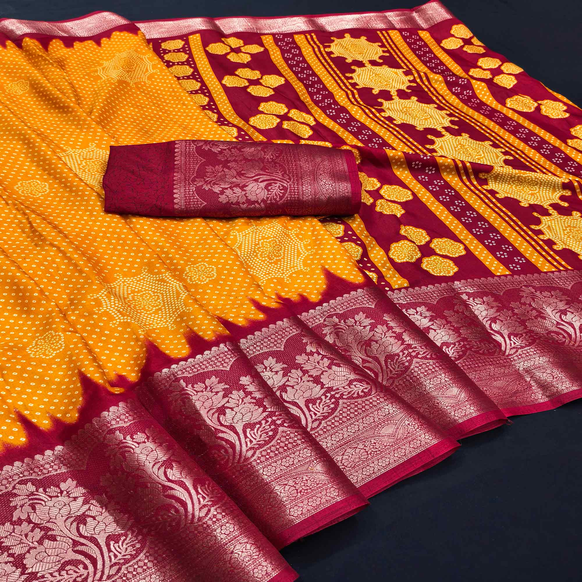 Orange Bandhani Printed Dola Silk Saree Adorned With Luxe Floral Weaving Border Work