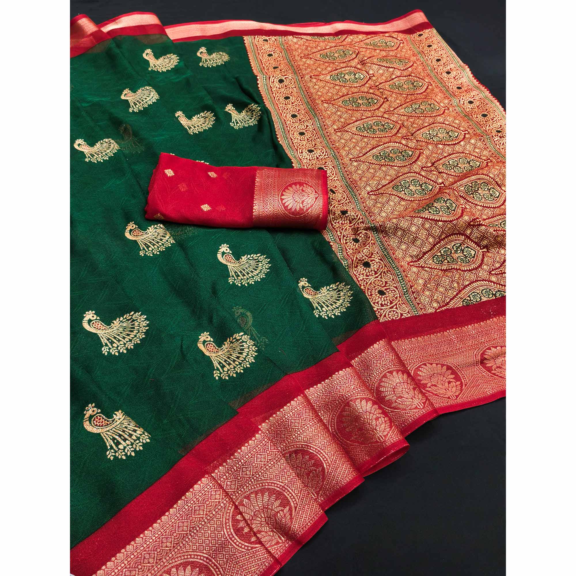 Festive Dark Green Dola Silk Saree Enhanced with Ornate Zari Weaving