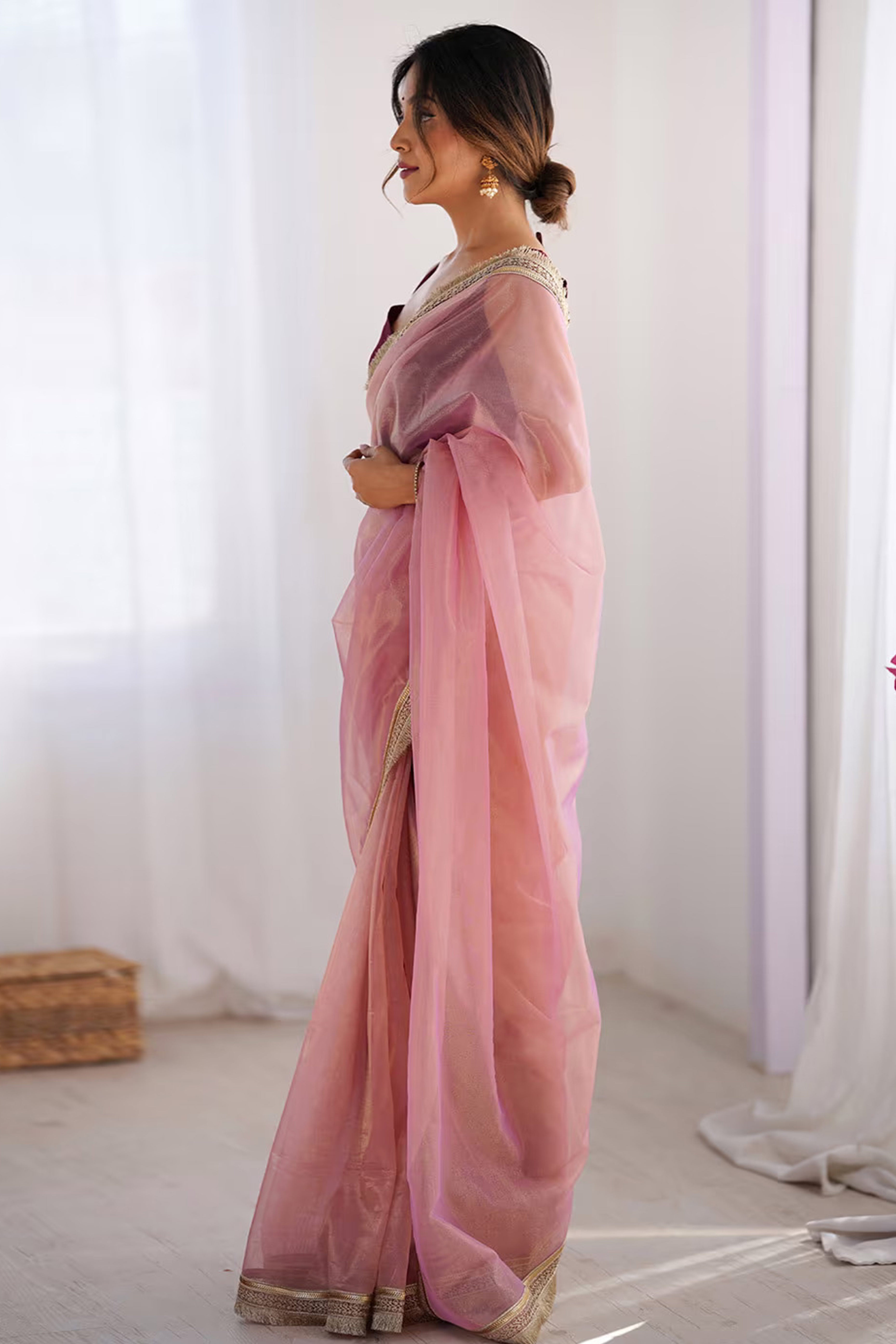 Feminine Rose Pink Solid Net Saree with Sophisticated Lace Border Work