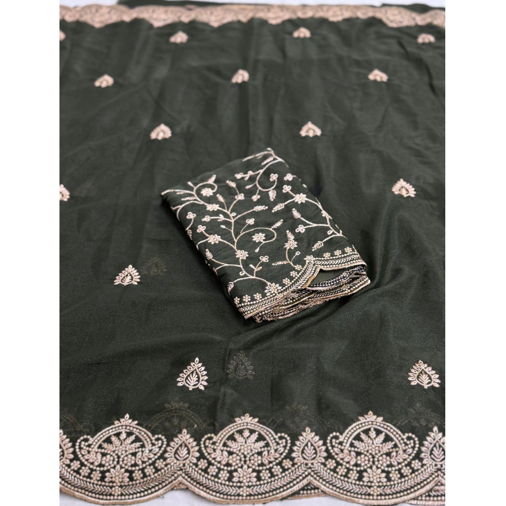 Gorgeous Mehendi Green Floral Embroidered Georgette Saree Accented With Luxurious Zari Work