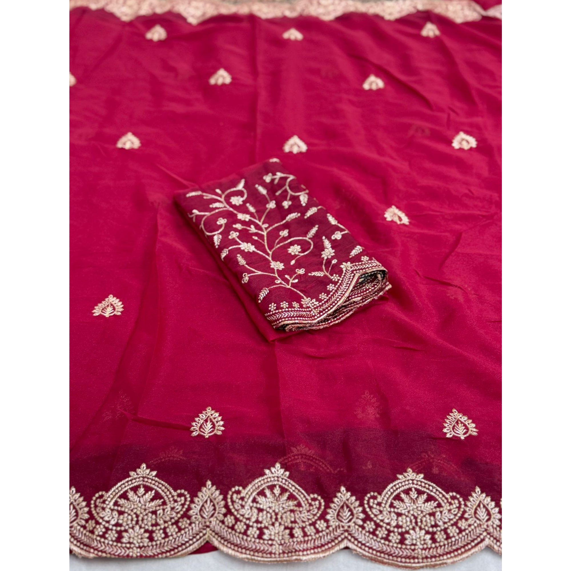 Gorgeous Pink Floral Embroidered Georgette Saree Accented With Luxurious Zari Work