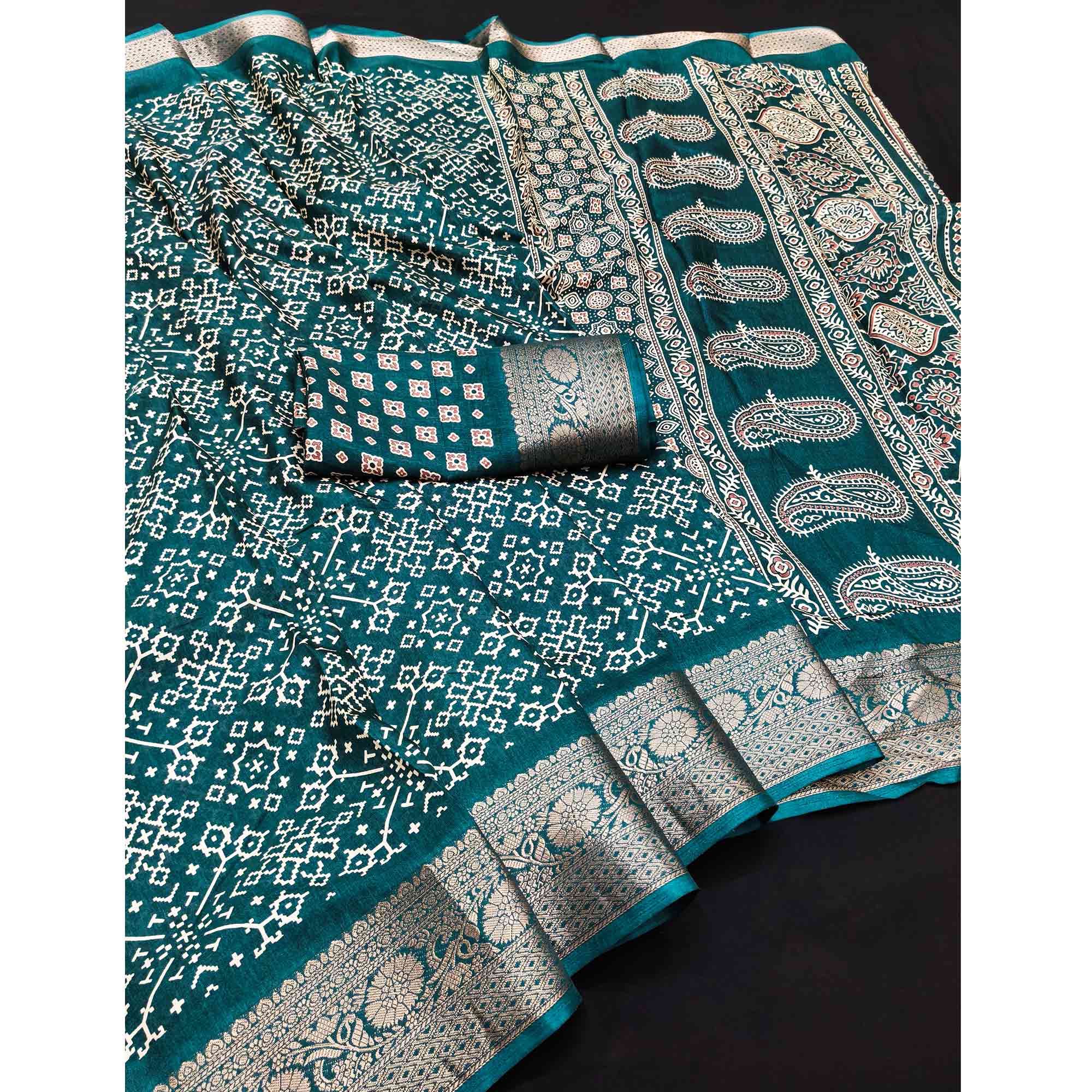 Contemporary Teal Geometric Mill Printed Dola Silk Saree With Ornate Floral Zari Border
