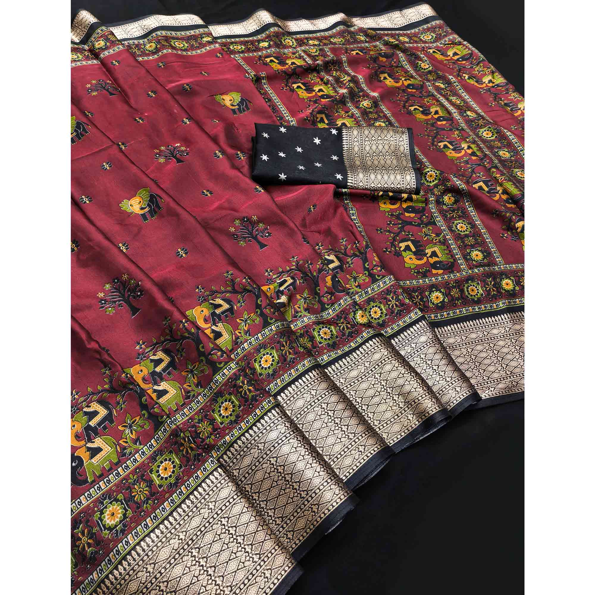Majestic Maroon Elephant & Floral Printed Dola Silk Saree Featuring Intricate Weaving Border
