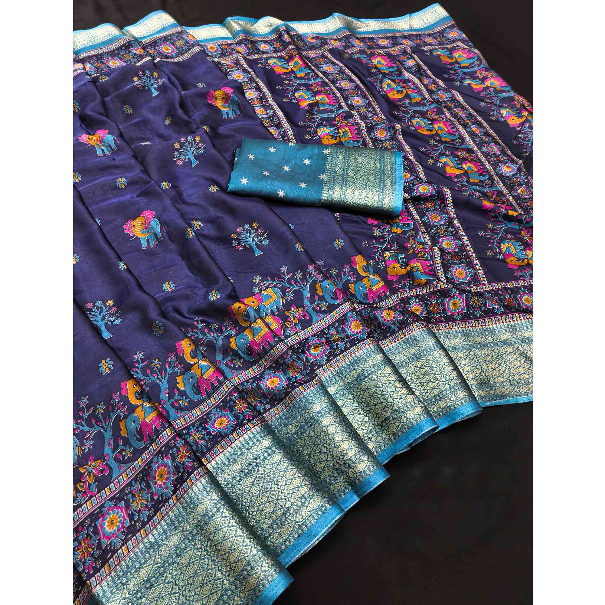 Majestic Navy Blue Elephant & Floral Printed Dola Silk Saree Featuring Intricate Weaving Border