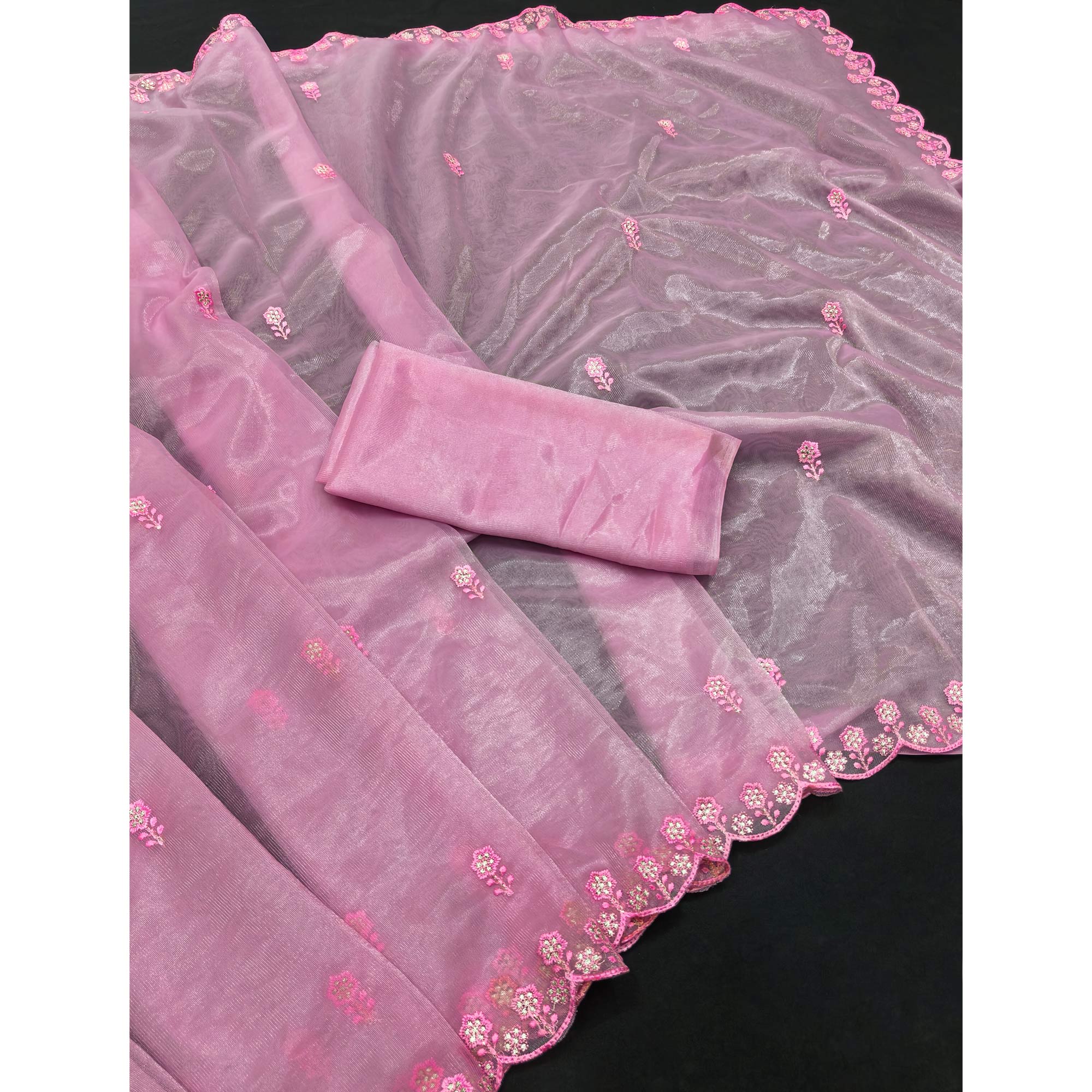 Pink Net Partywear Saree Featuring Fine Floral Embroidery and a Soft, Flowing Look