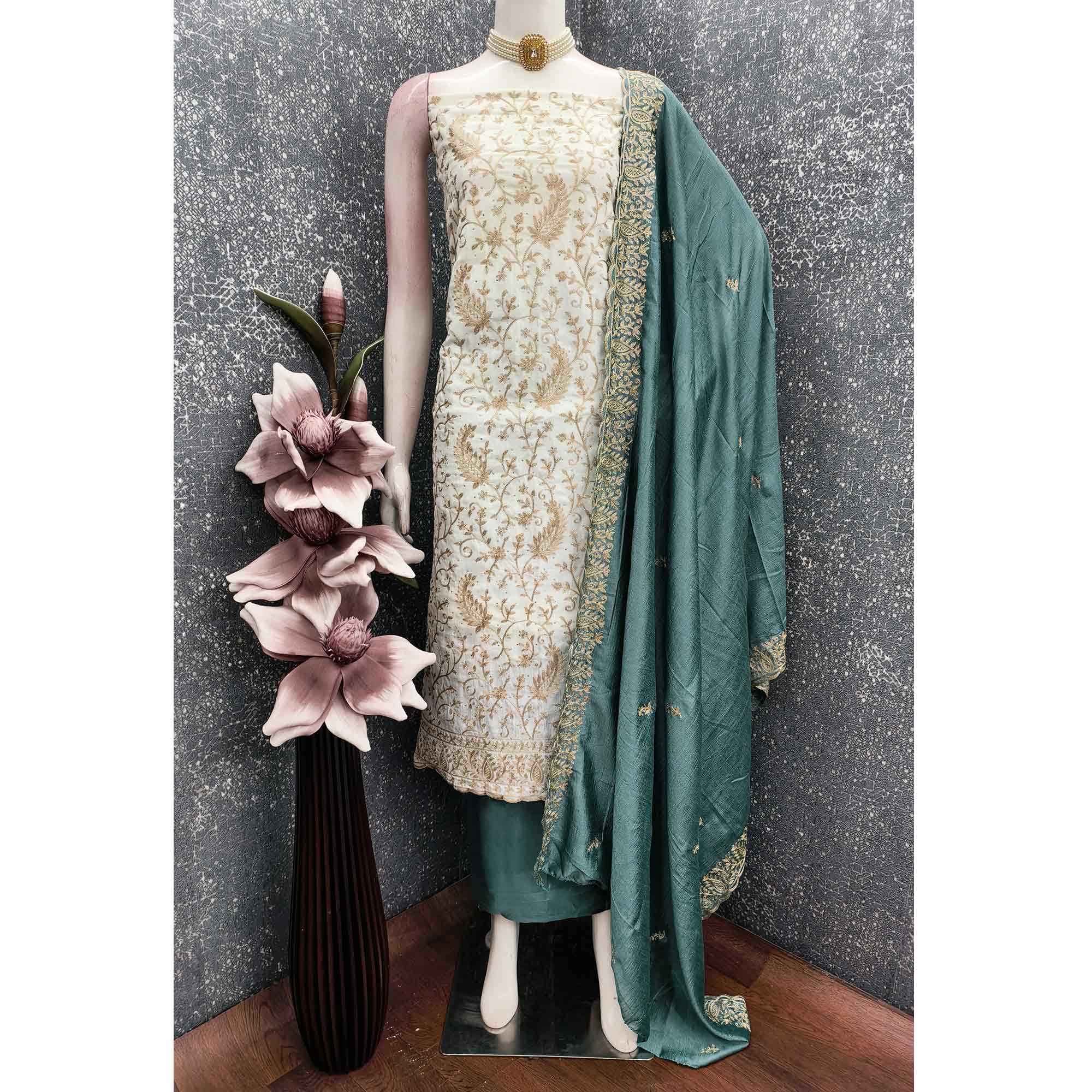 Cream & Teal Lustrous Vichitra Silk Dress Material Accented with Artistic Thread Embroidery