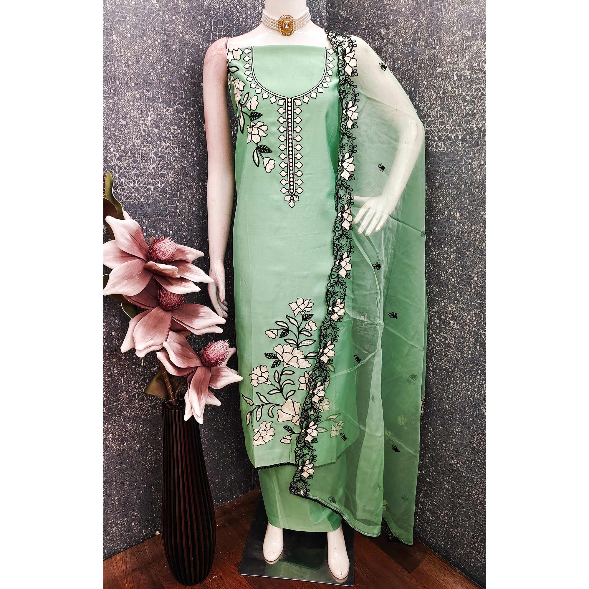 Graceful Mint Green Floral Viscose Dress Material Enhanced With Intricate Thread Embroidery Work