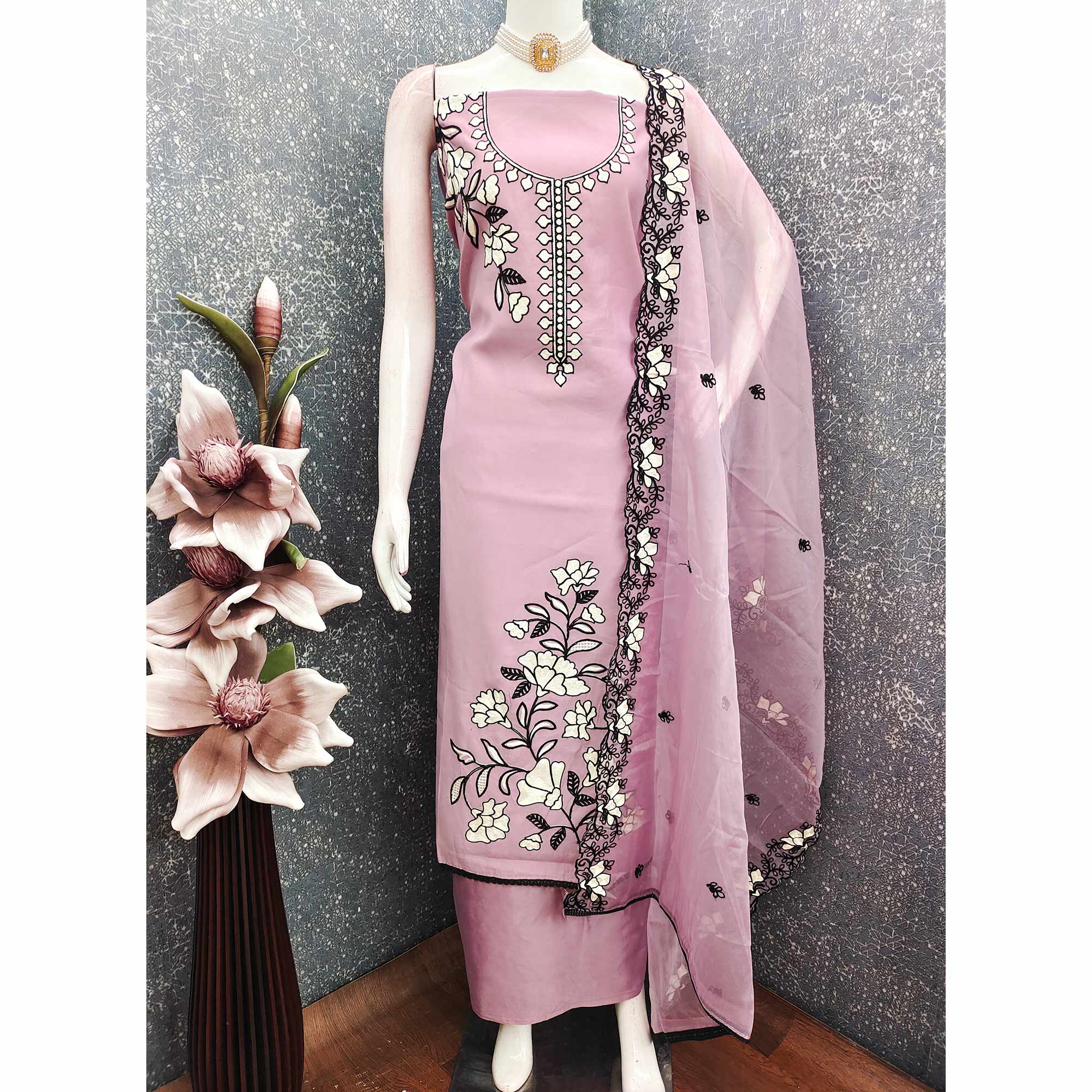 Graceful Onion Pink Floral Viscose Dress Material Enhanced With Intricate Thread Embroidery Work