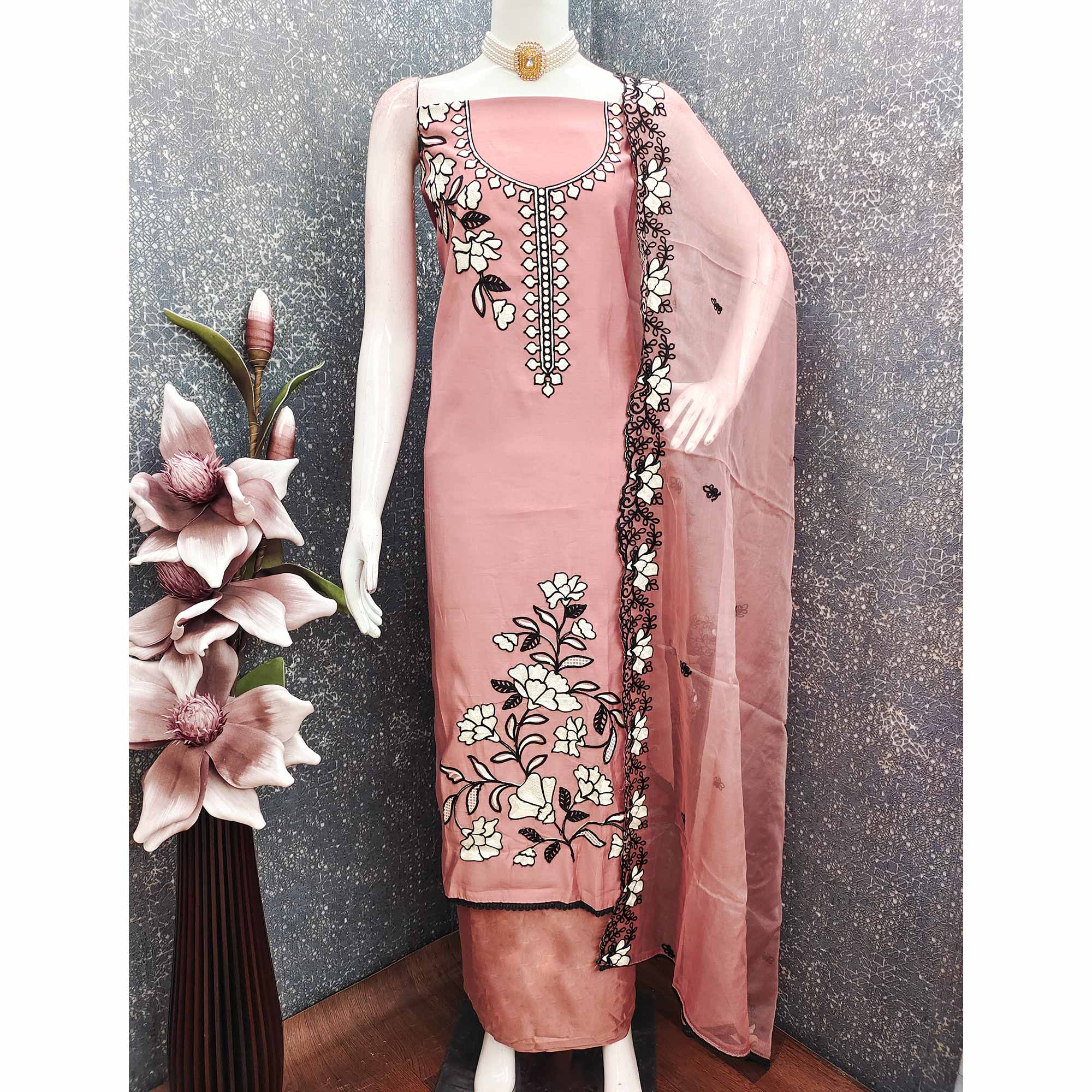 Graceful Peach Floral Viscose Dress Material Enhanced With Intricate Thread Embroidery Work