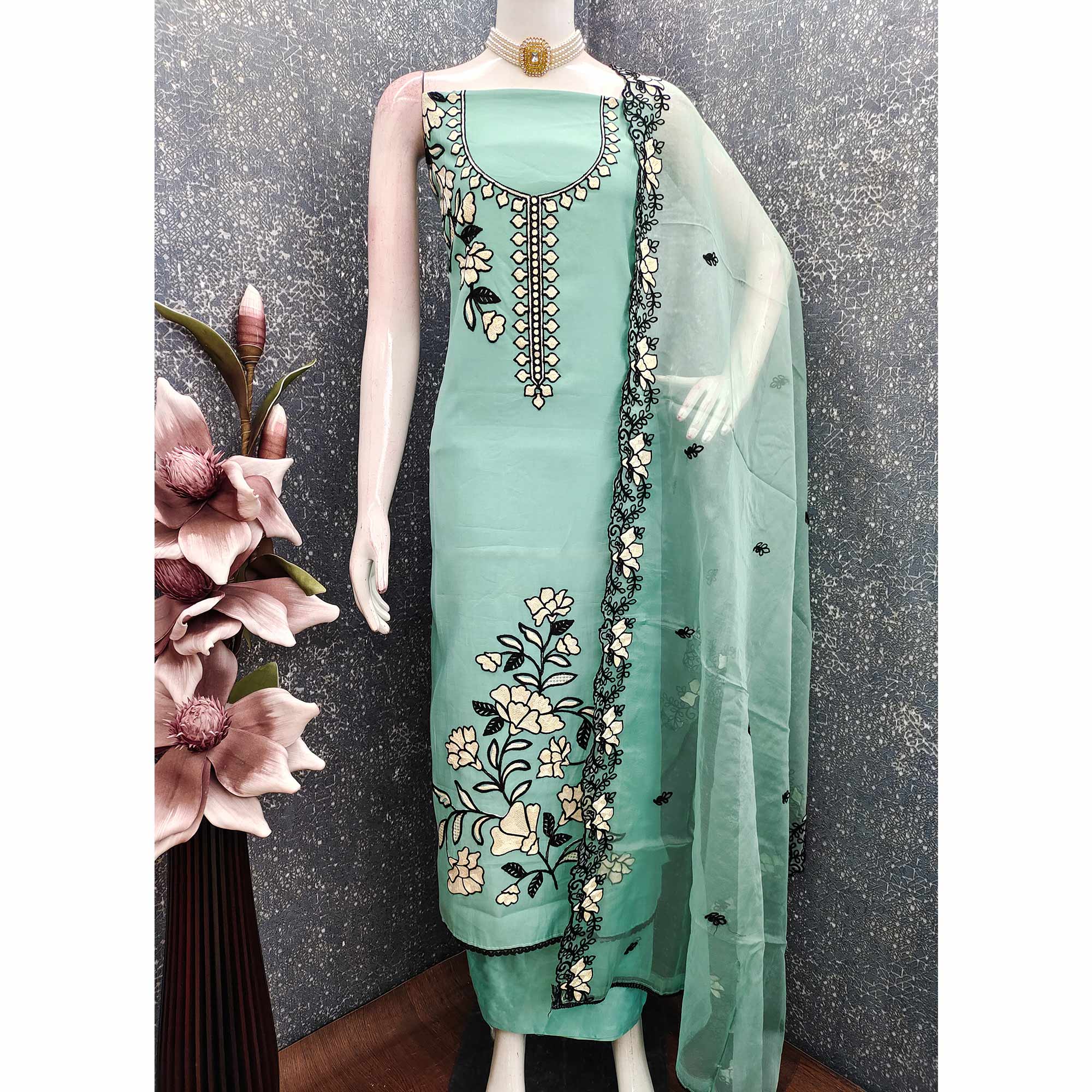 Graceful Turquoise Floral Viscose Dress Material Enhanced With Intricate Thread Embroidery Work