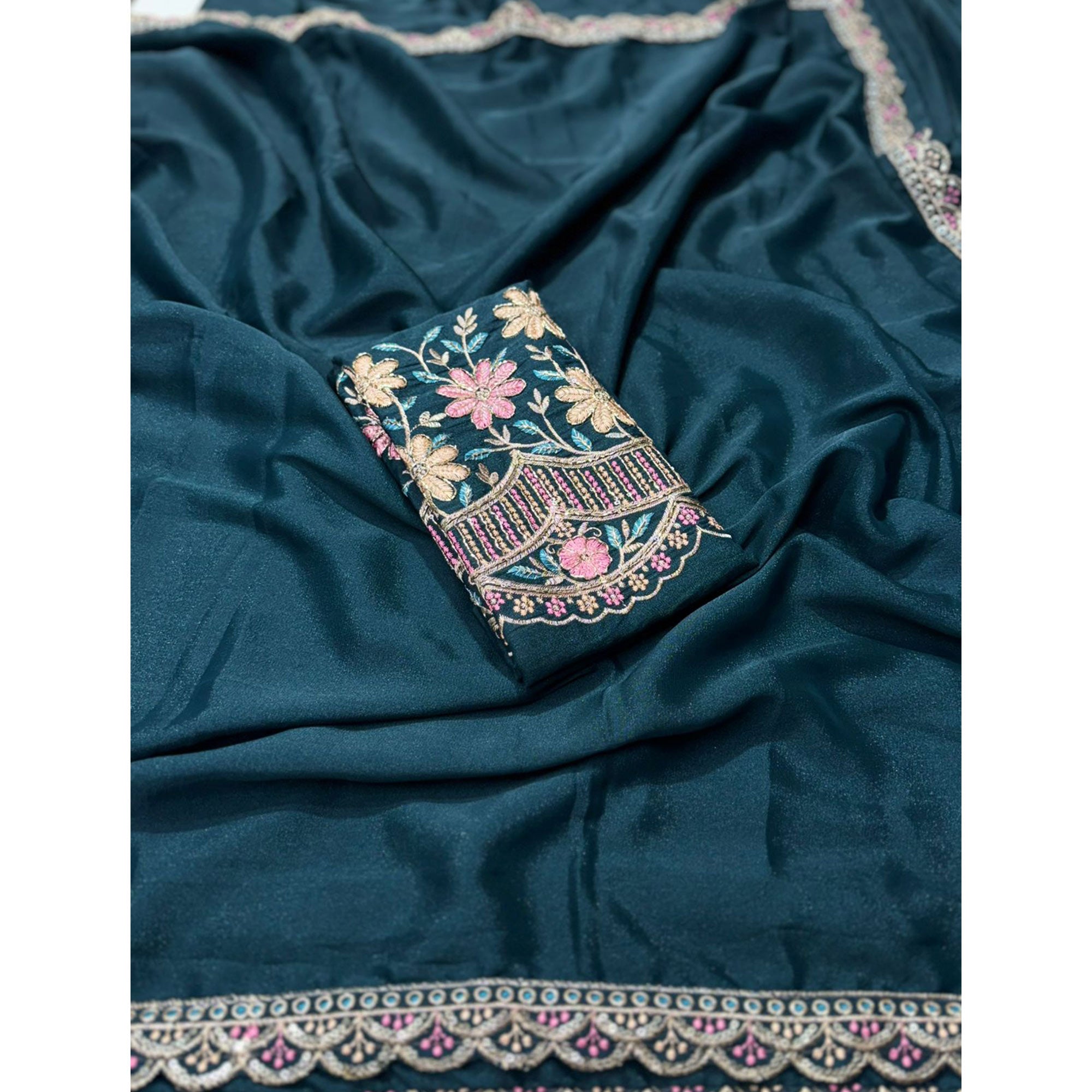 Teal Solid Georgette Saree With Embroidered Blouse Piece And Embroidered Border