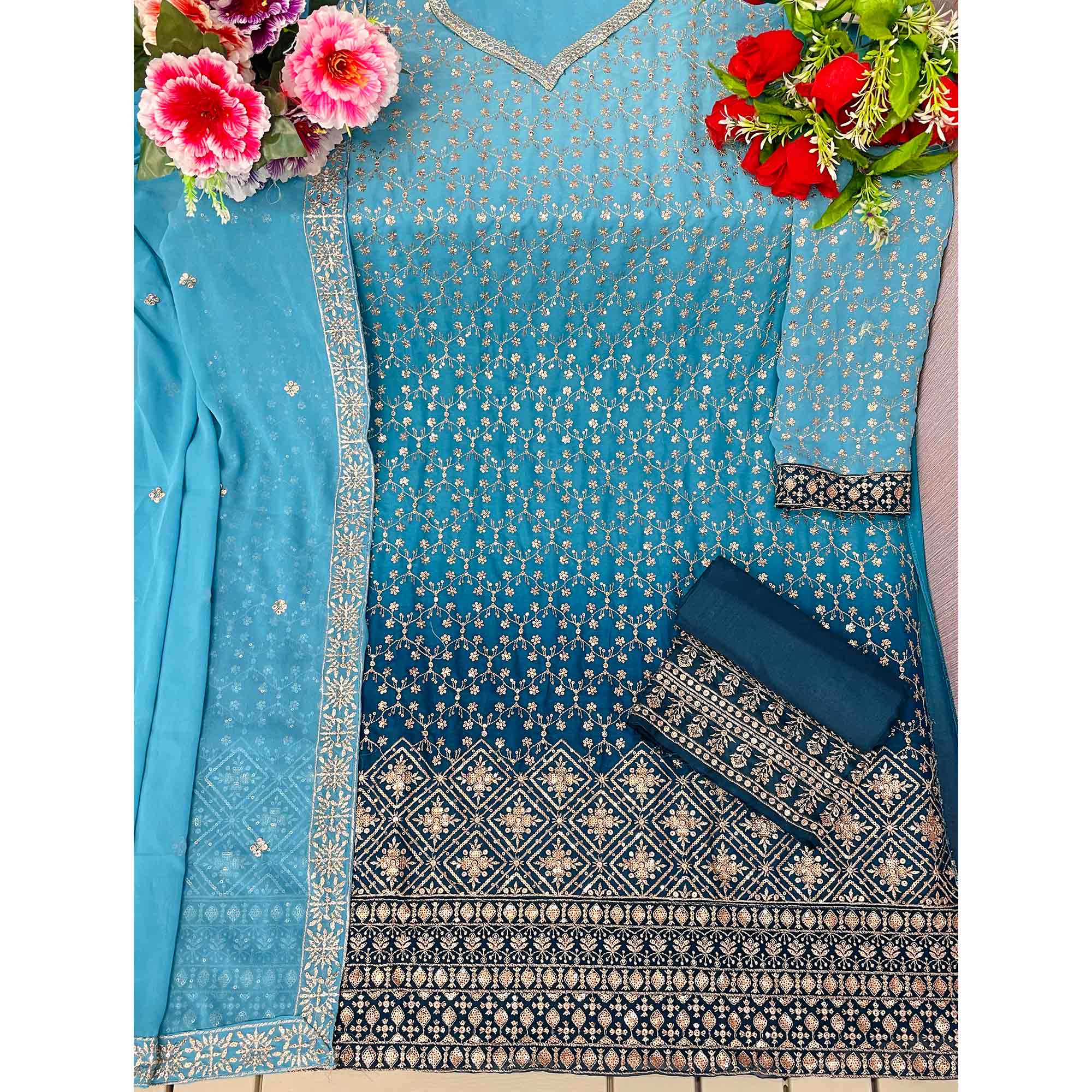 Sky Blue Sequins Embroidered Georgette Semi Stitched Suit
