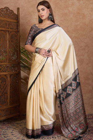 Cream & Black Modal Satin Saree Featuring a Solid Base and Artisanal Ajrakh Pallu