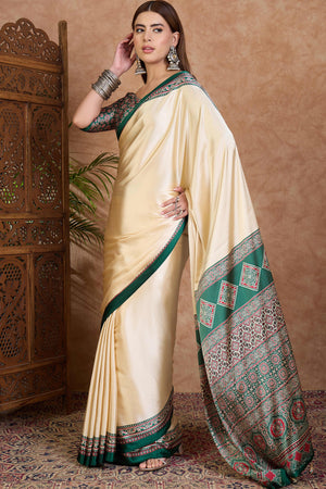 Cream & Green Modal Satin Saree Featuring a Solid Base and Artisanal Ajrakh Pallu