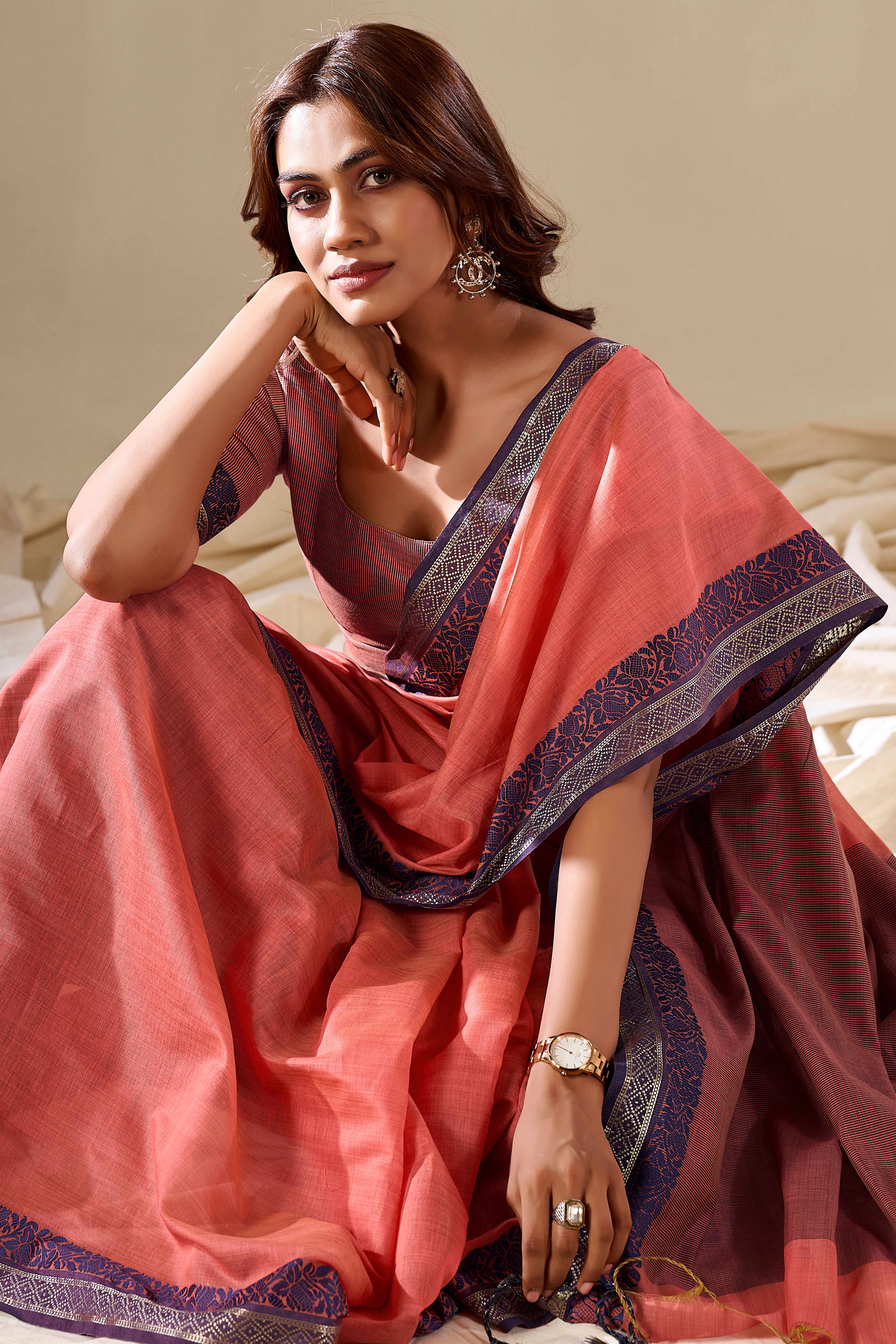 Peach Khaadi Saree with Elegant Solid Body and Contrast Weaving Border