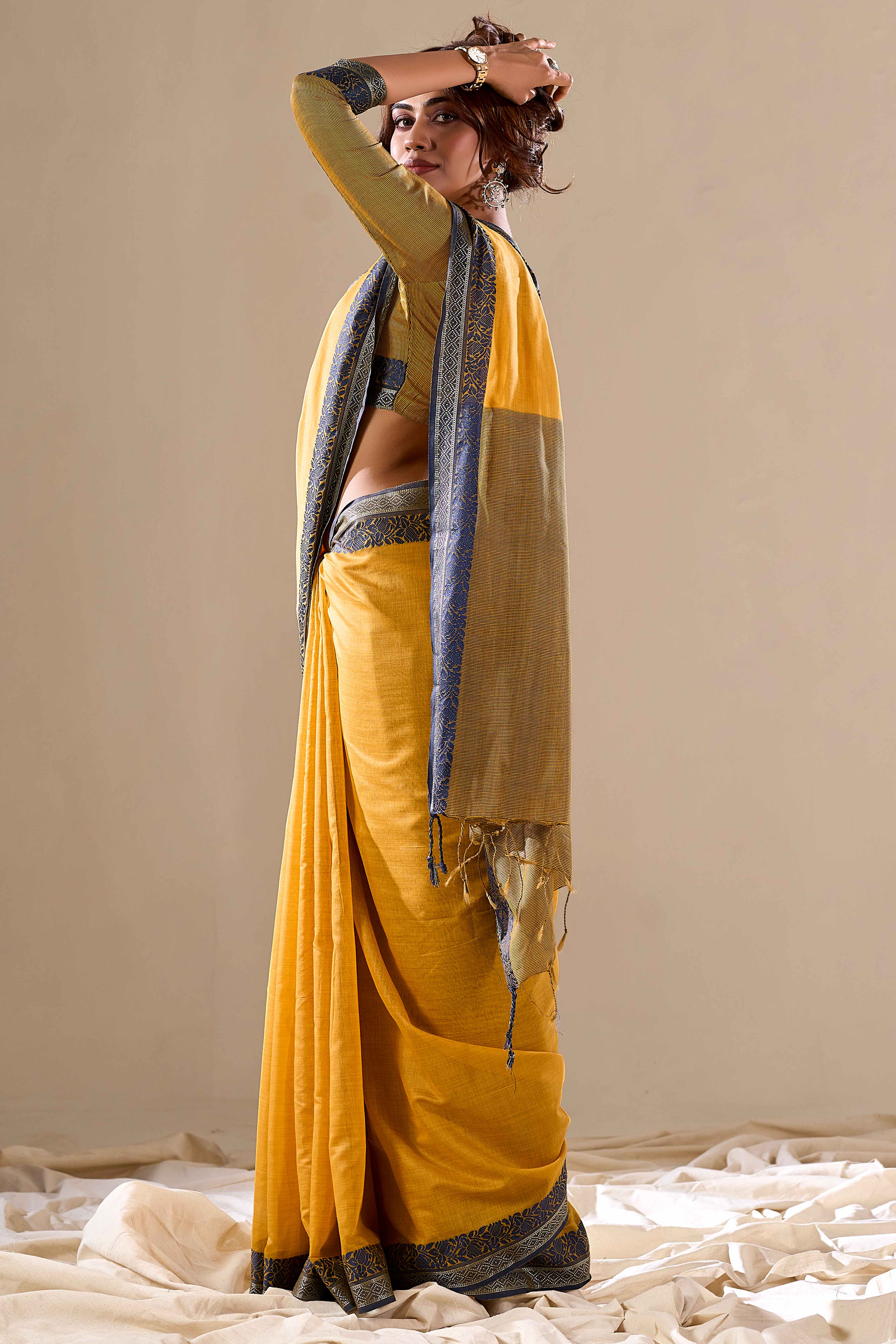 Mustard Khaadi Saree with Elegant Solid Body and Contrast Weaving Border