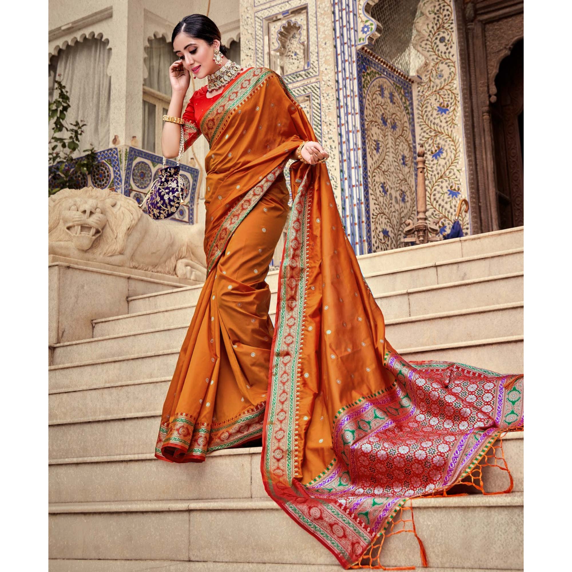 Orange Woven Pure Silk Saree With With Tassels