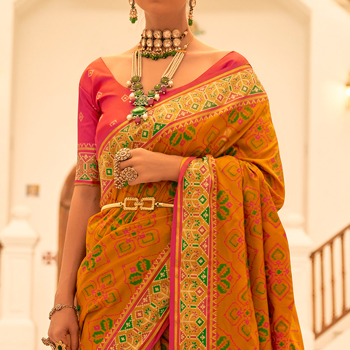 Mustard Patola Printed Banarasi Silk Saree With Tassels