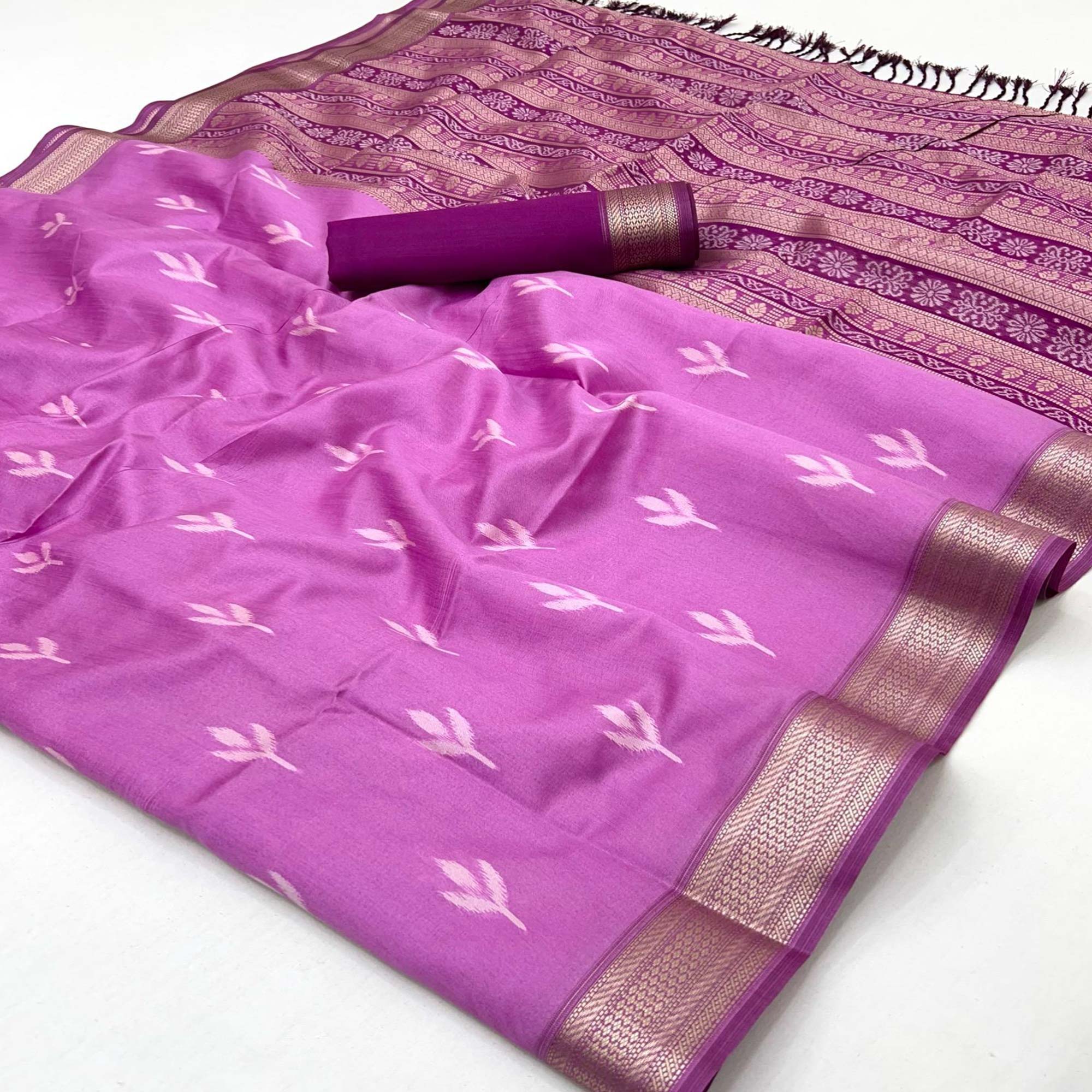 Purple Ikkat Style Rayon Silk Saree with Luxurious Zari Border and Delicate Tassels
