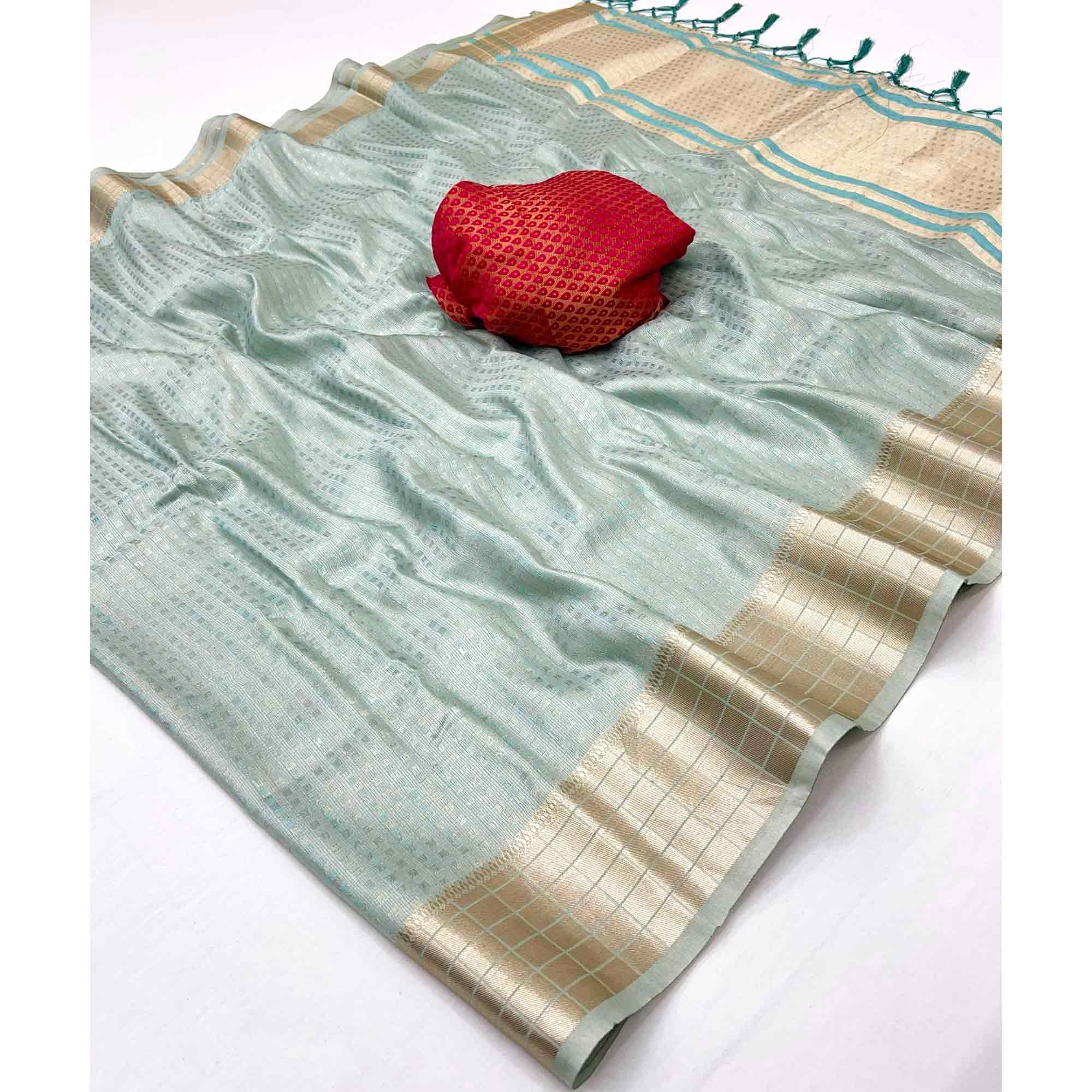 Sky Blue Soft Tissue Saree Featuring Rich Zari-Woven Detailing.