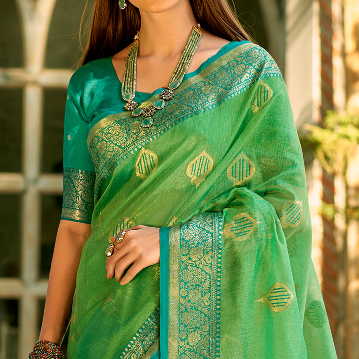 Green Floral Woven Tissue Silk Saree With Tassels