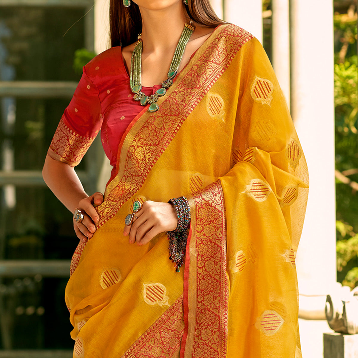 Yellow Floral Woven Tissue Silk Saree With Tassels