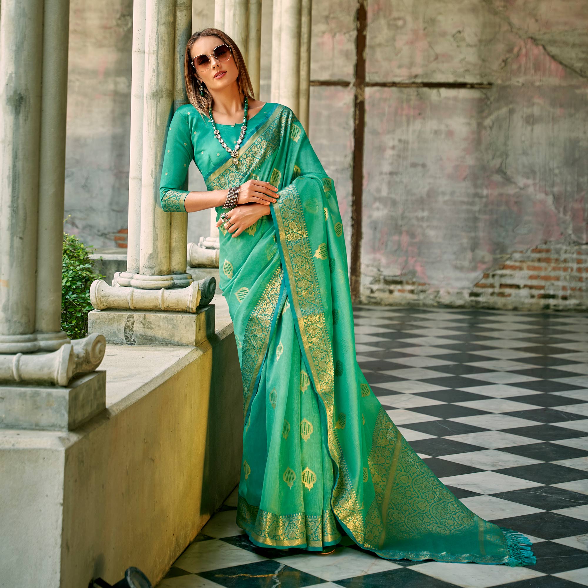 Rama Green Floral Woven Tissue Silk Saree With Tassels
