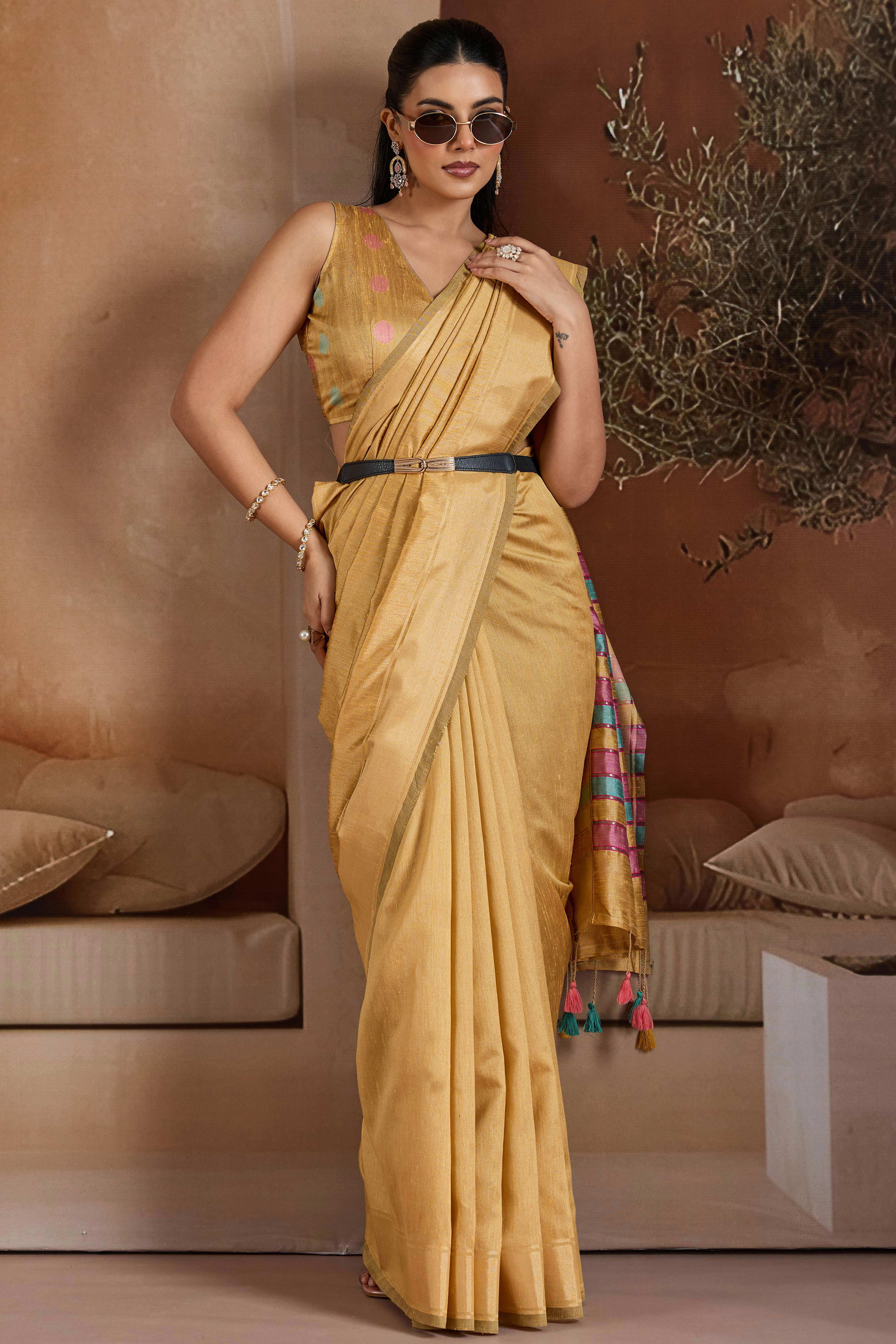 Graceful Chikoo Zari Woven Bhagalpuri Silk Saree Accented With Tassel Pallu