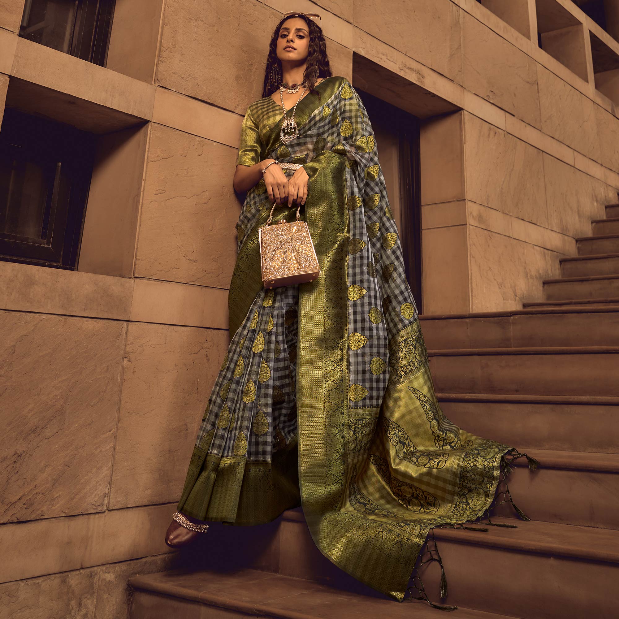 Black Checks Woven Organza Saree With Tassels