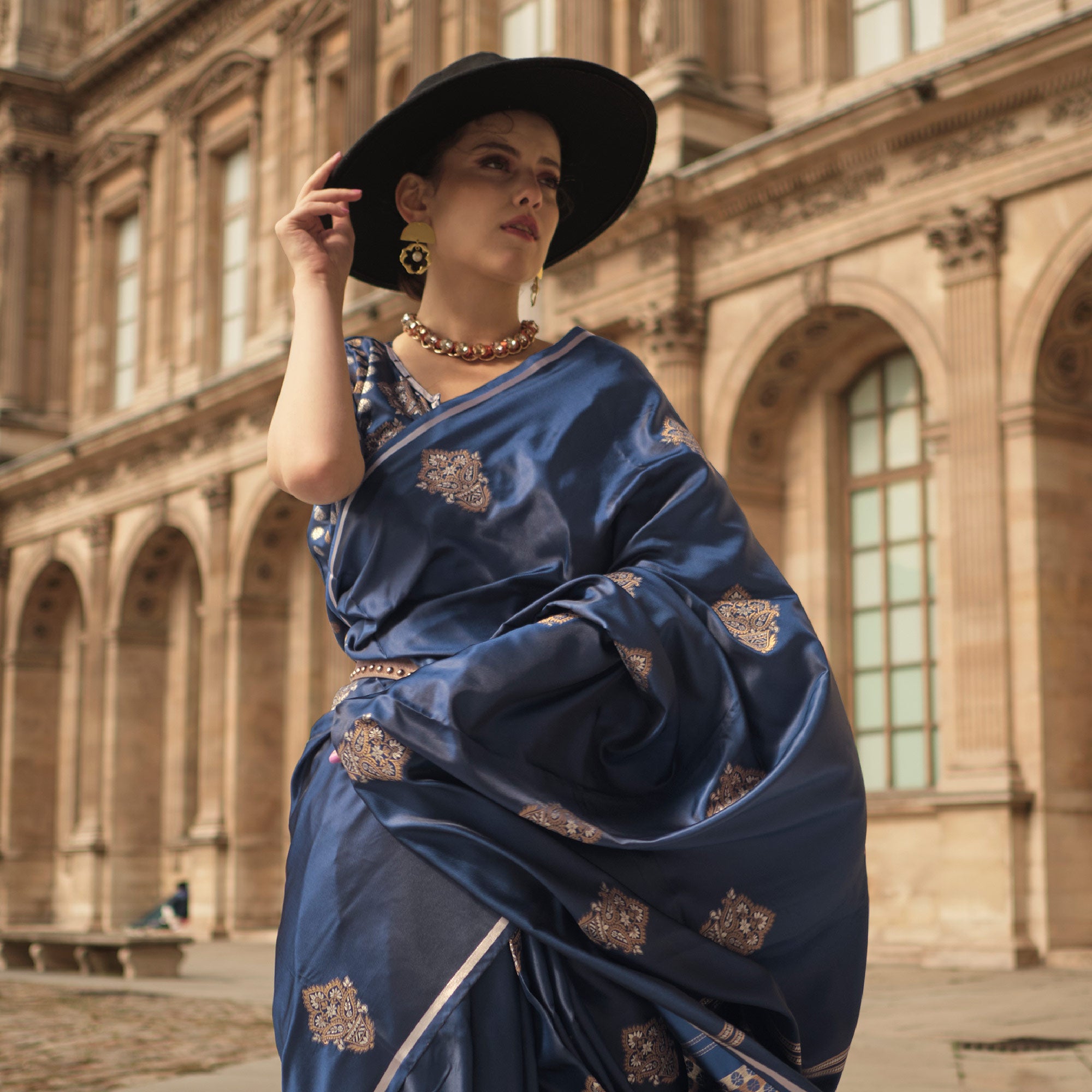 Blue Floral Woven Satin Saree With Tassels