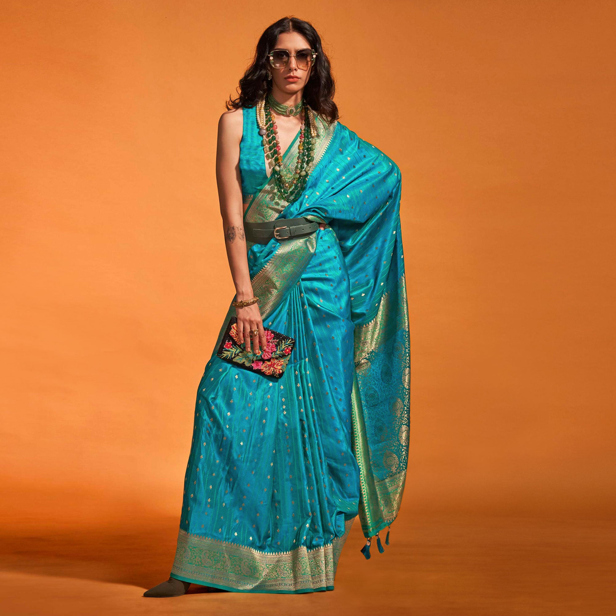 Rama Blue Woven Zari Border Satin Saree With Tassels